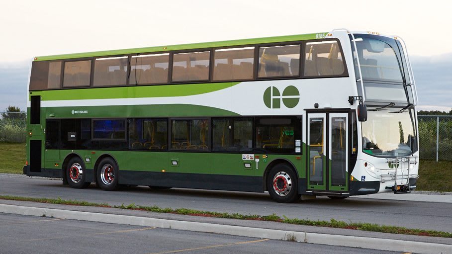 A bus moves along a side road.