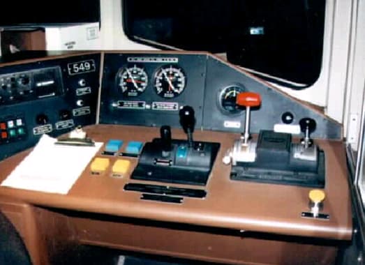 Train controls are shown, including a red throttle and speed guages.