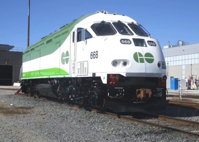 A large Tier 4 engine waits on a service rail.