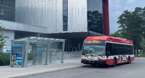 a bus at a stop.