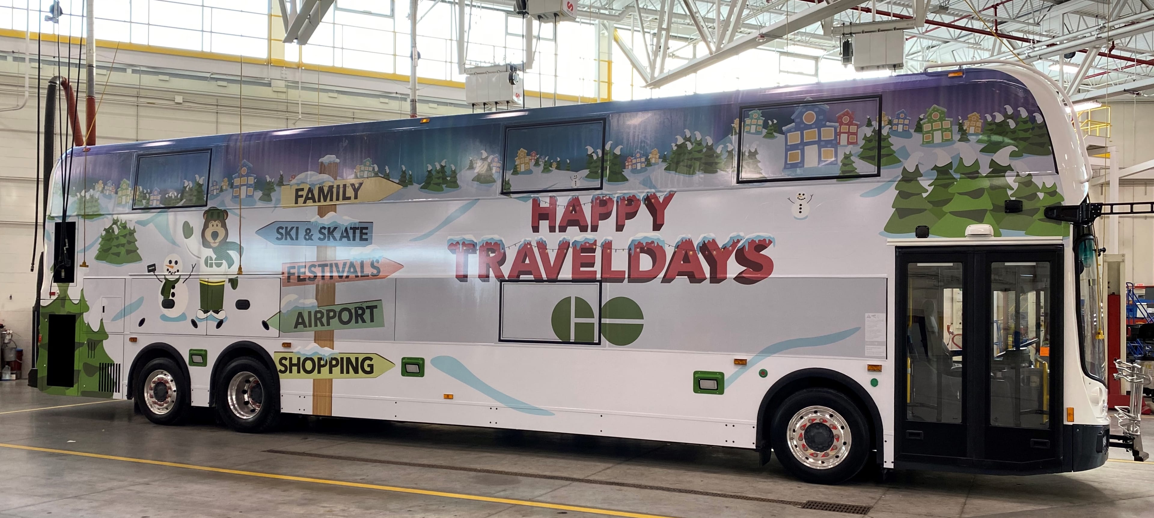 The GO bus with all the wraps completed. The words 'Happy Holidays' is written on the side.