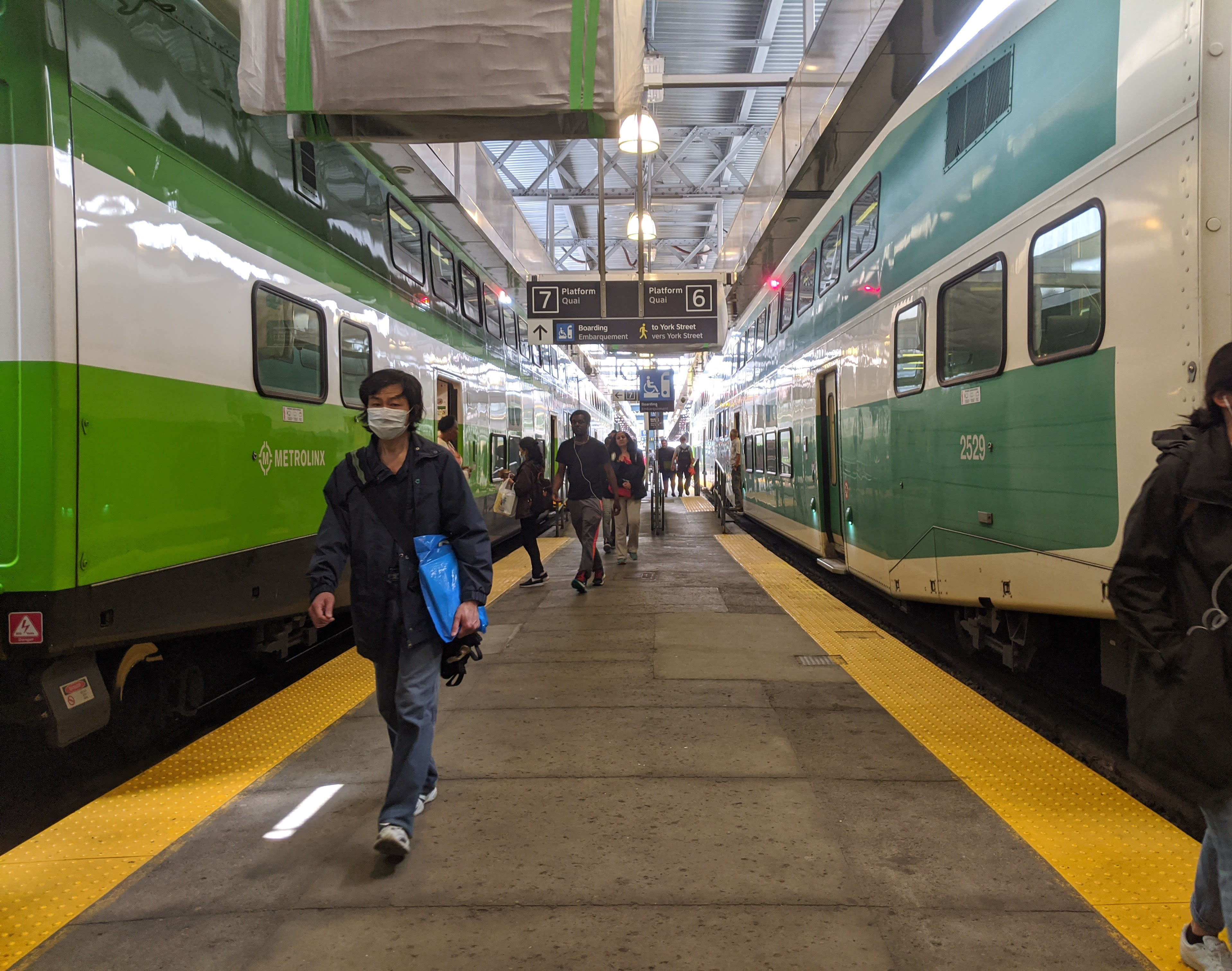 Travellers leave GO trains at Union Station.