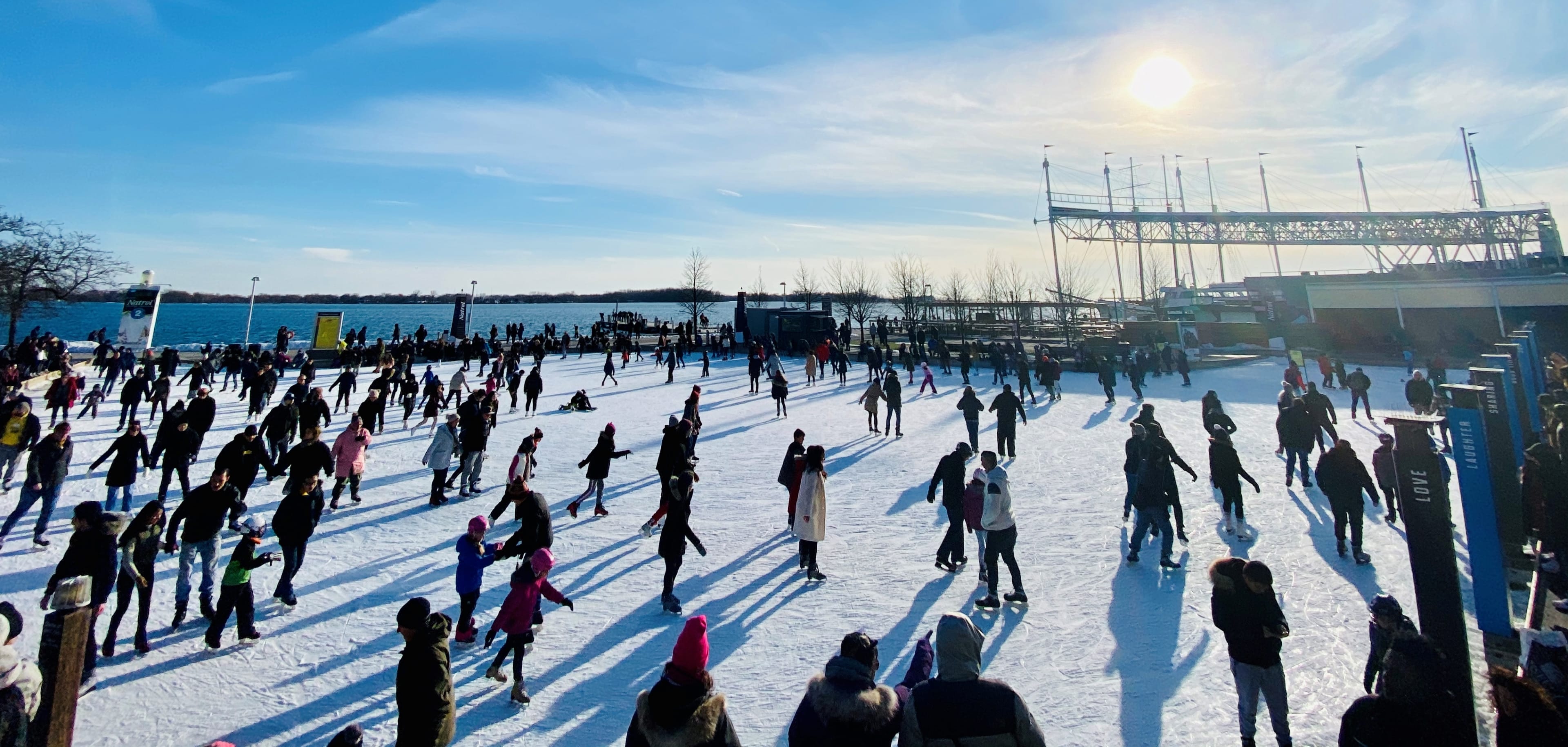Skaters make their way across ice at the rink at Harbourfront.