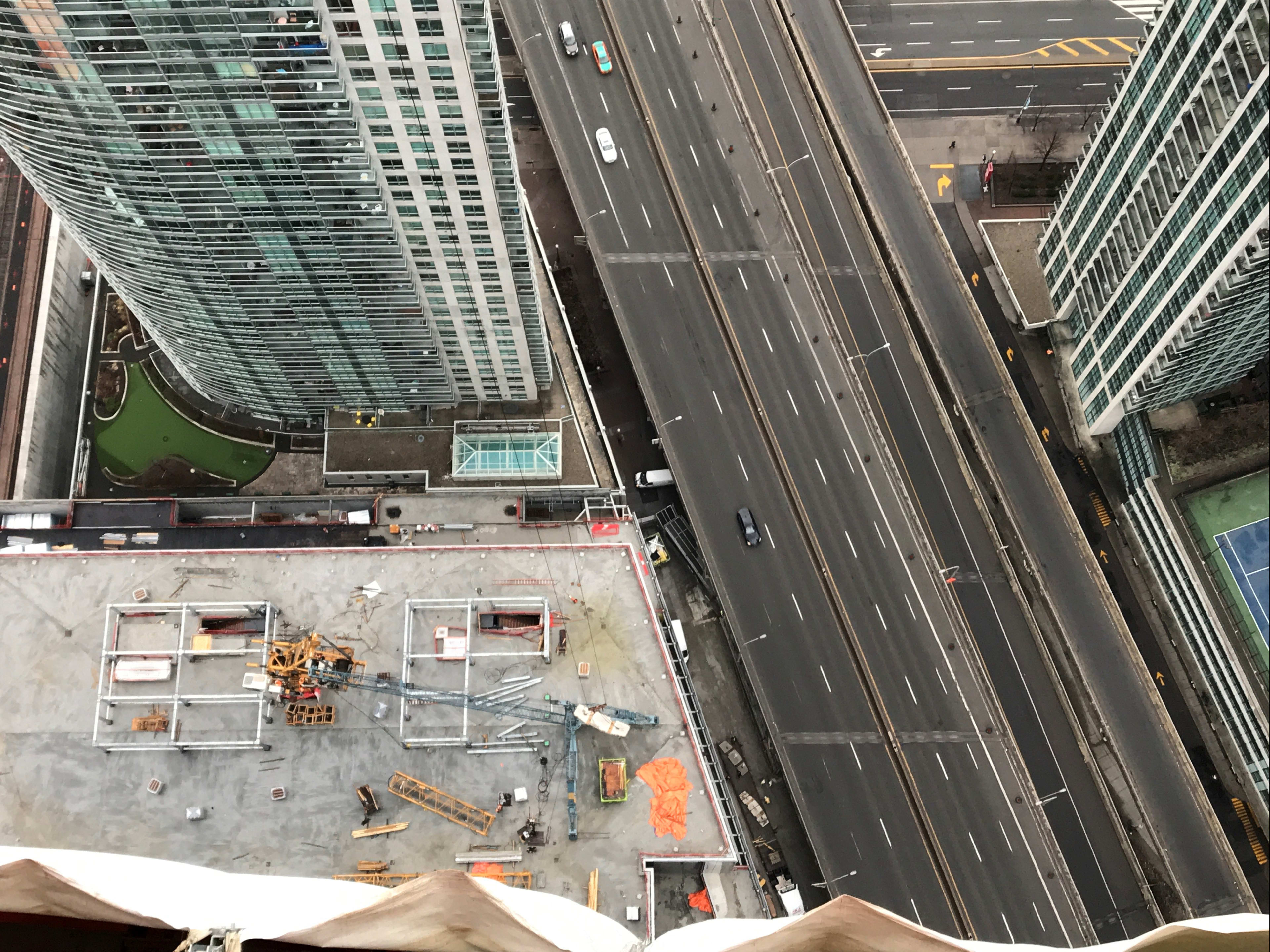 the view, looking down at cars travelling below.