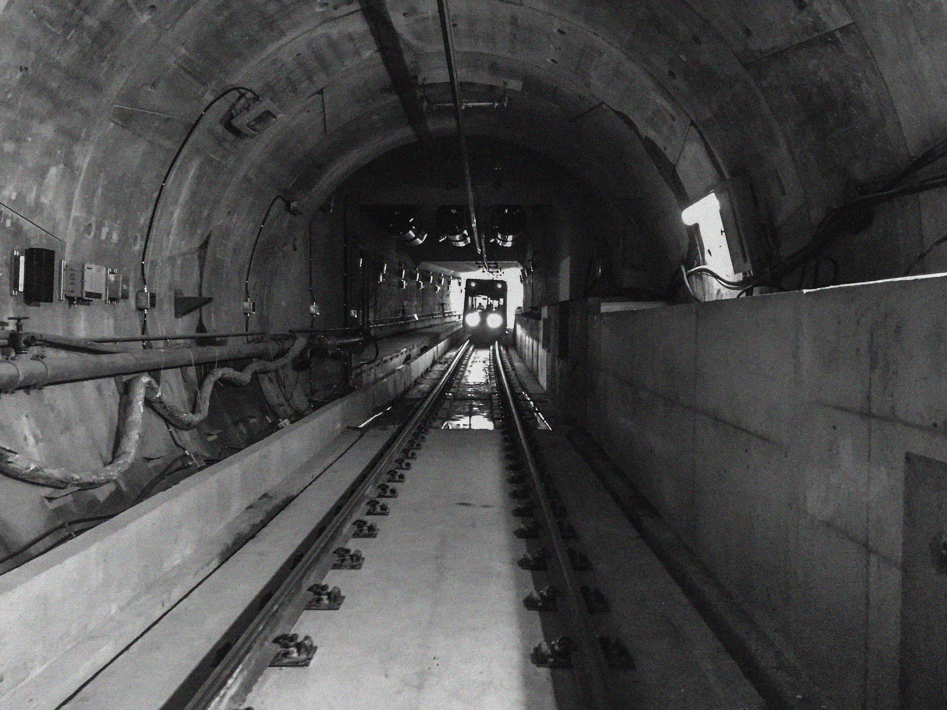 a LRV at the far end of a tunnel.