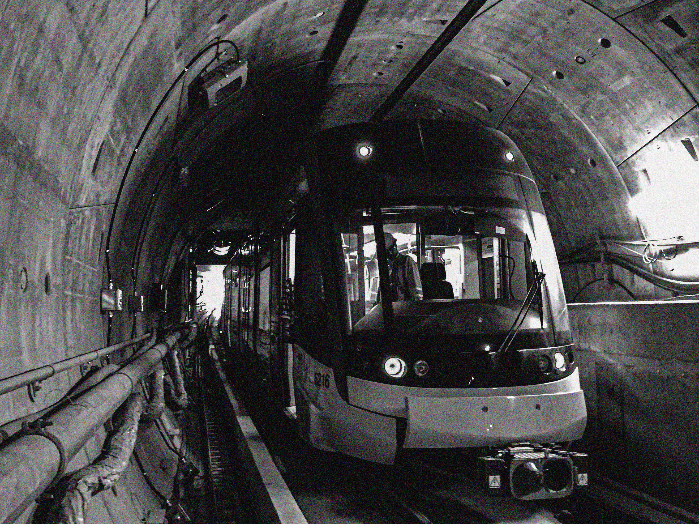 An LRV waits inside a tunnel.