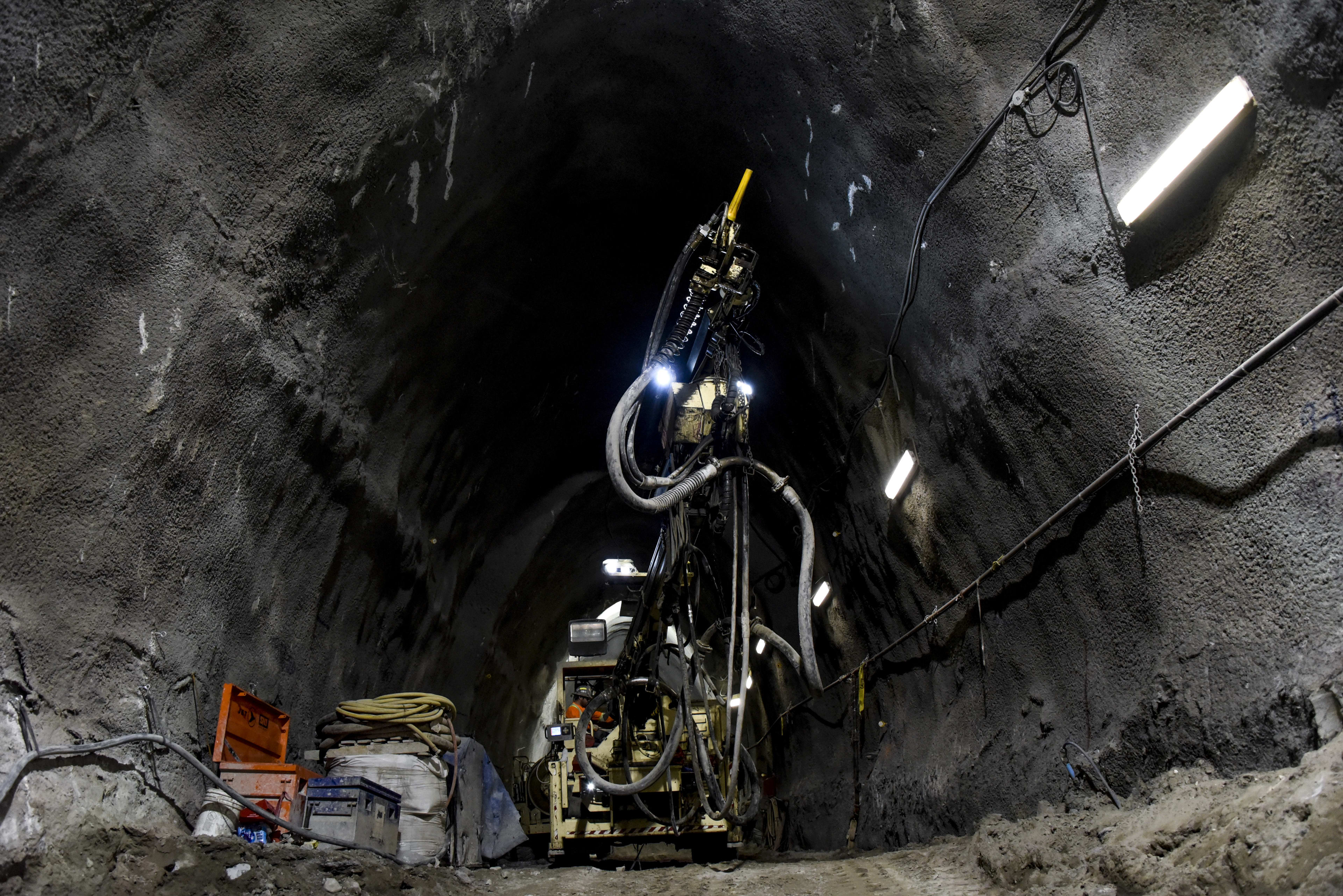 Heavy machinery continues to excavate caverns underground.