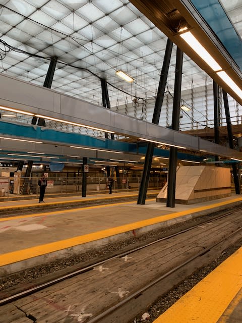 New lighting is suspended above two Union Station platforms.