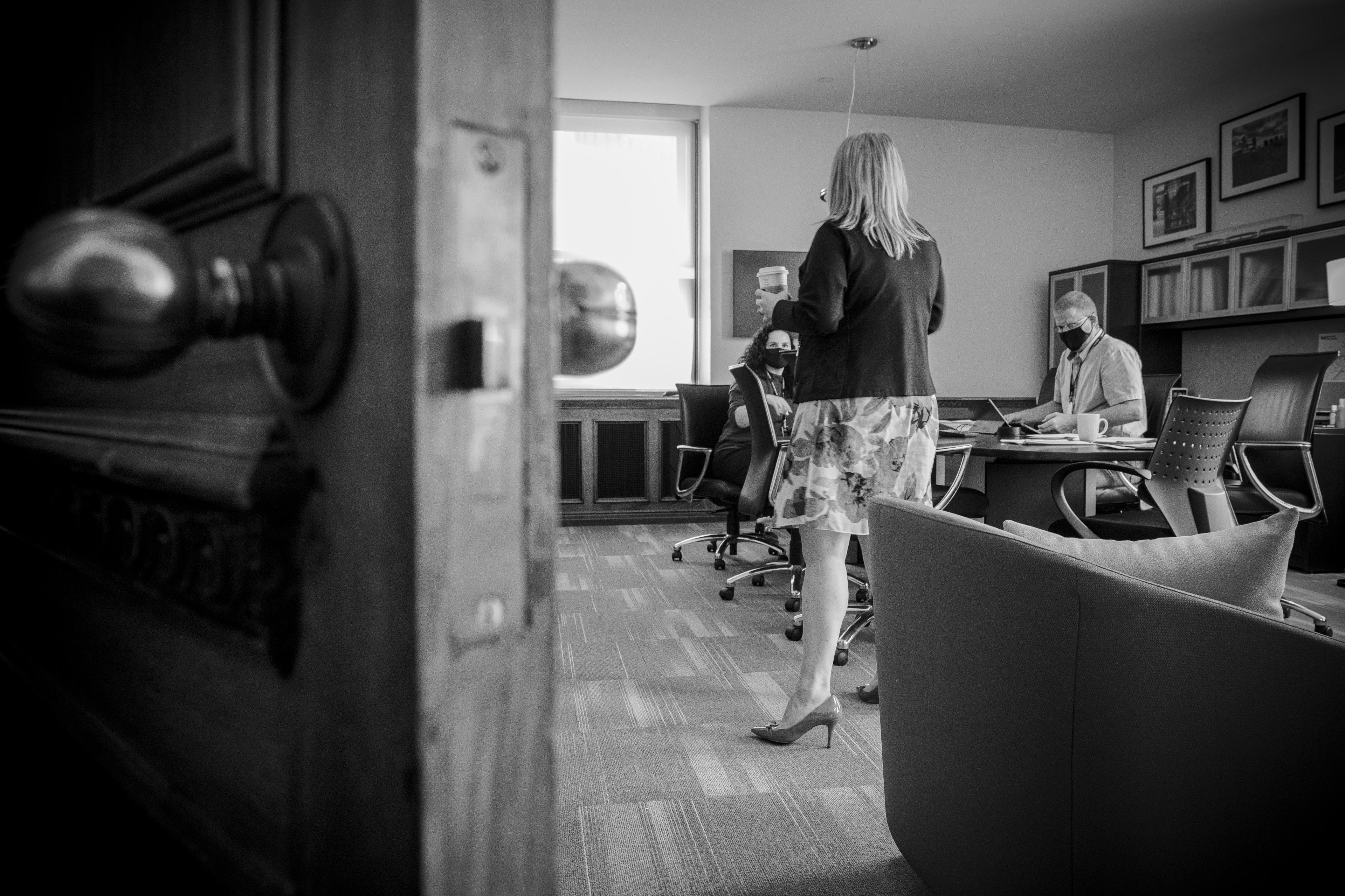 Phil Verster and his team is seen in his office.