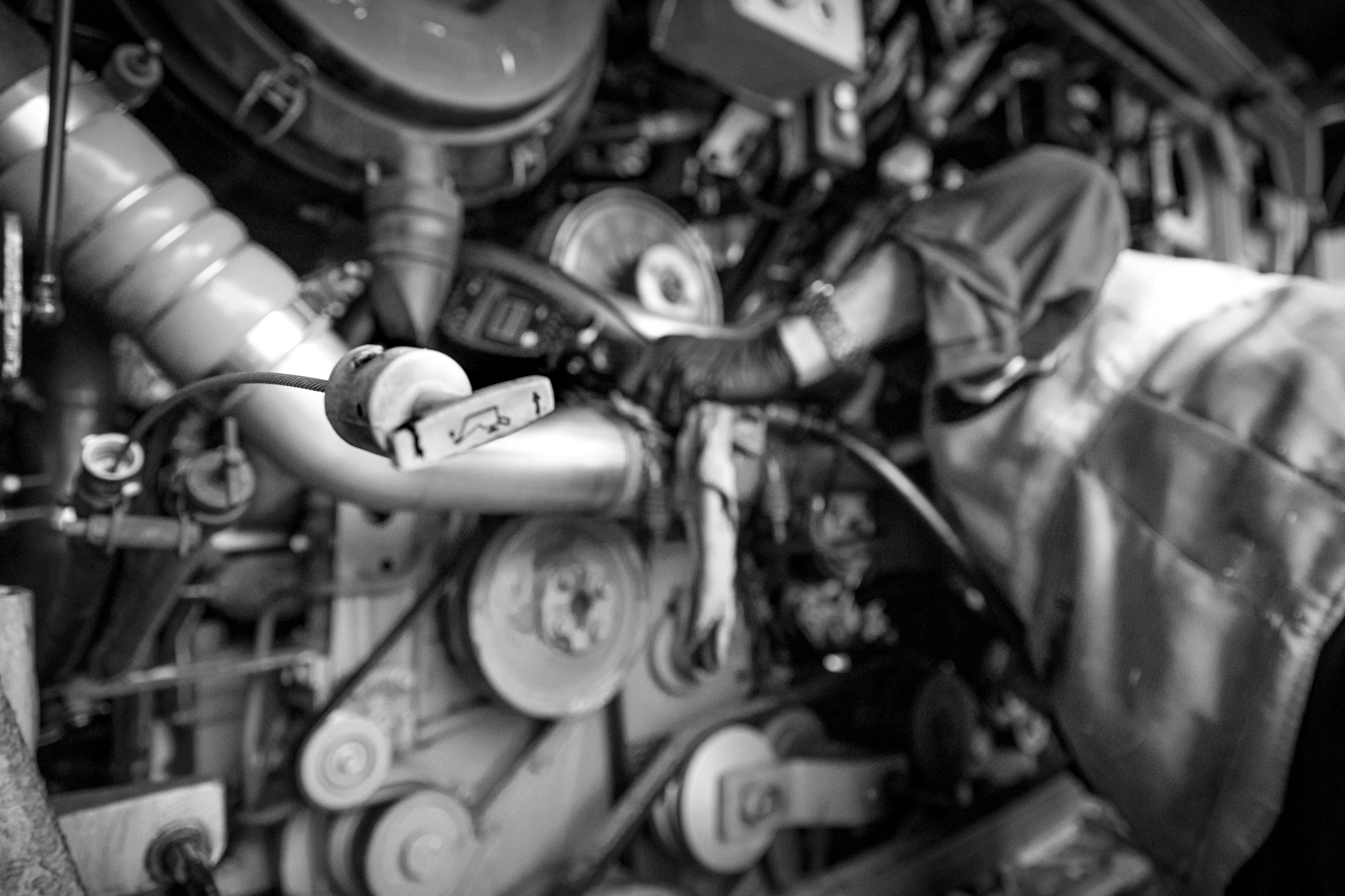 a man working on an engine.