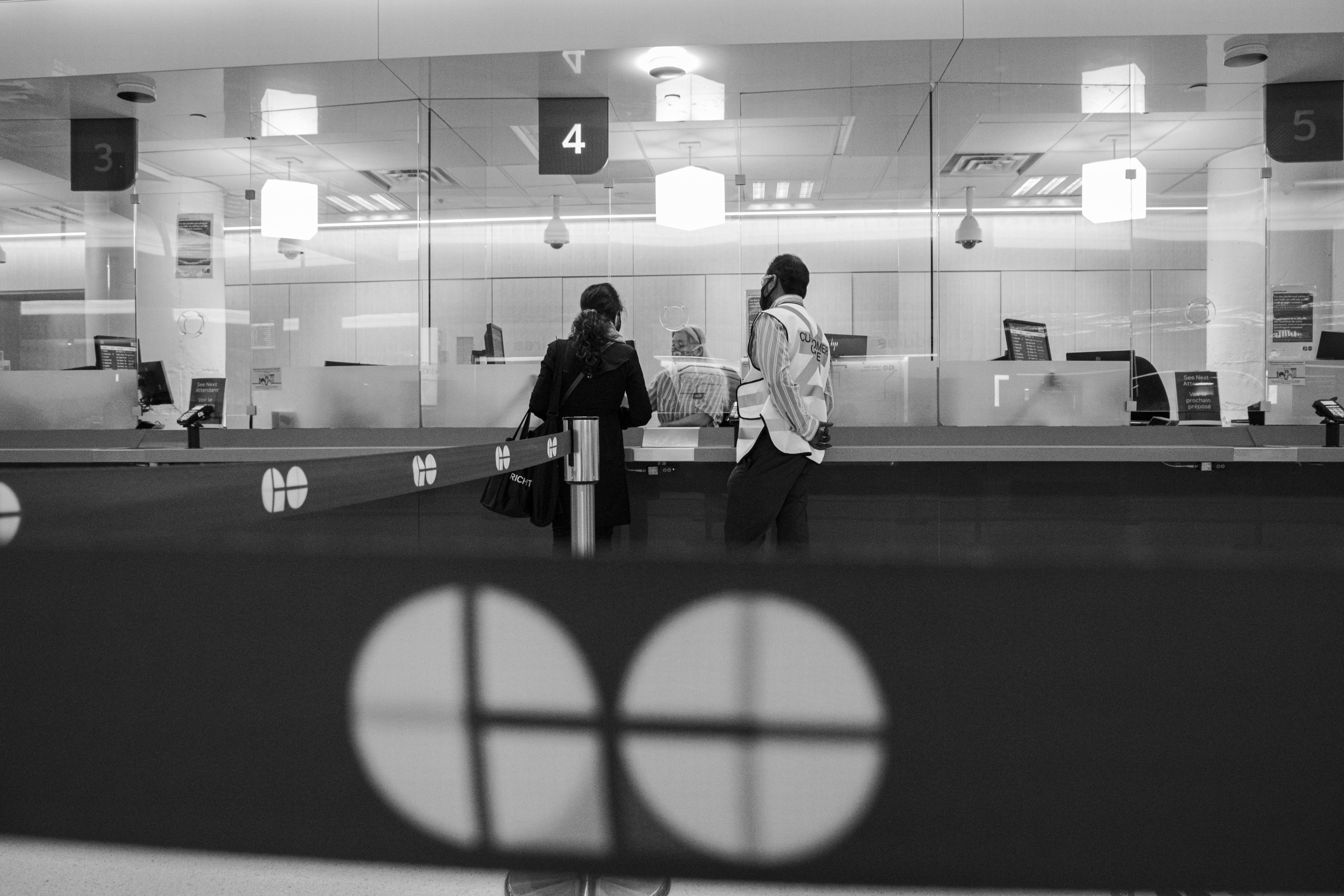 Customers are served at a window.