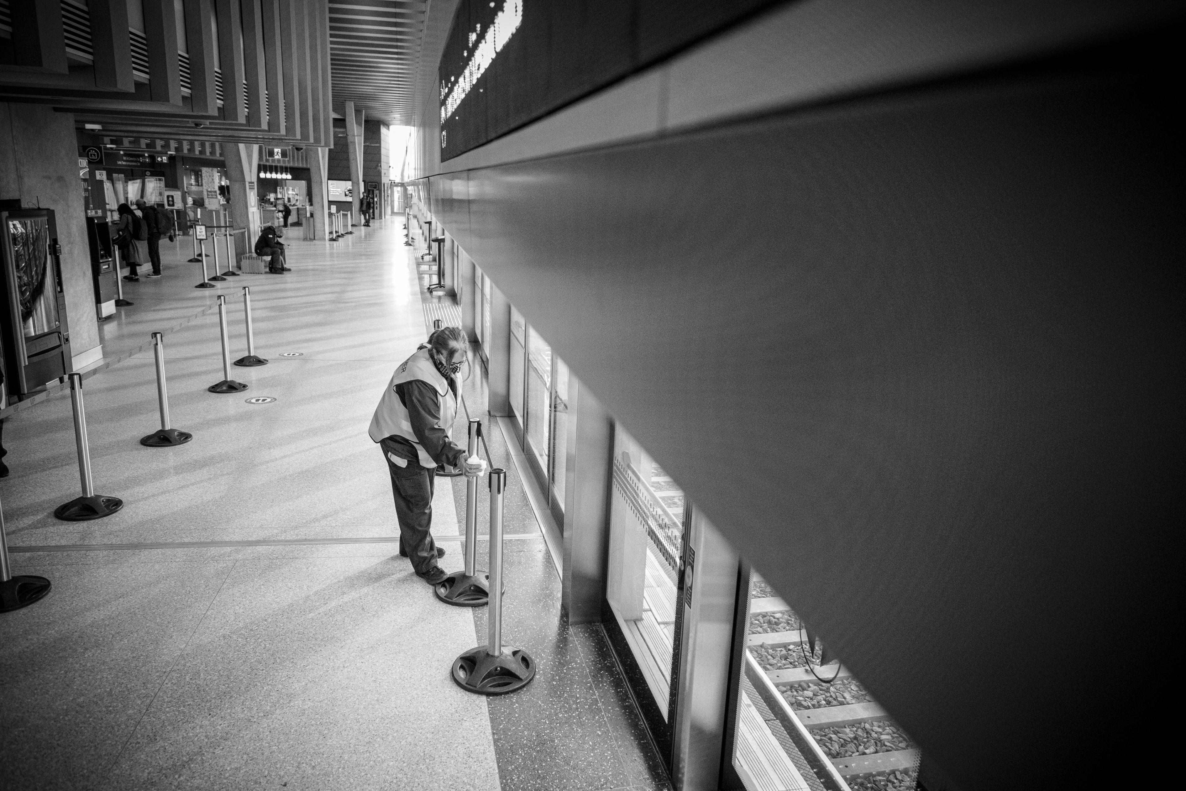 A worker cleans on the UP platform.