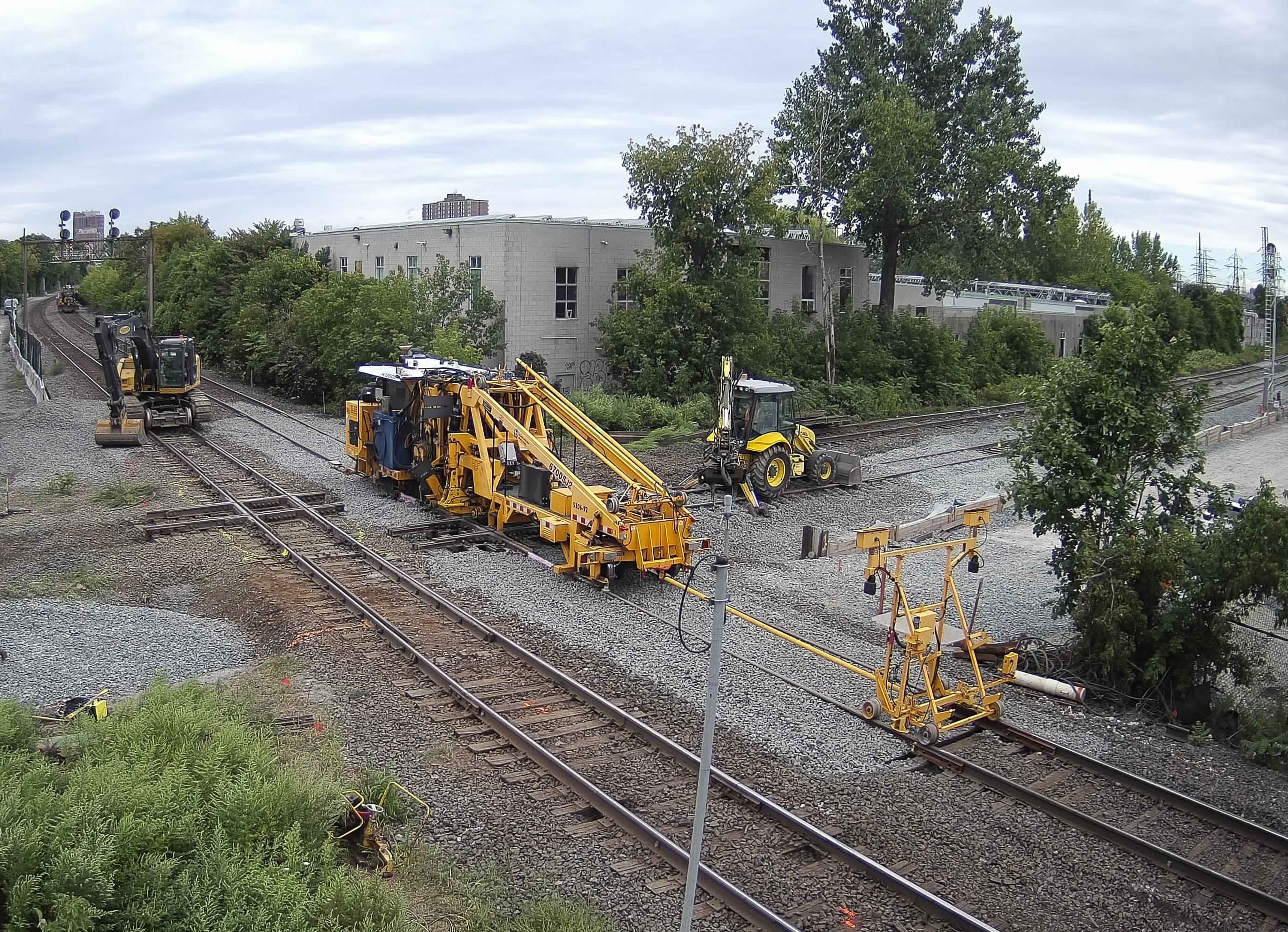 Track is put down by a large machine.