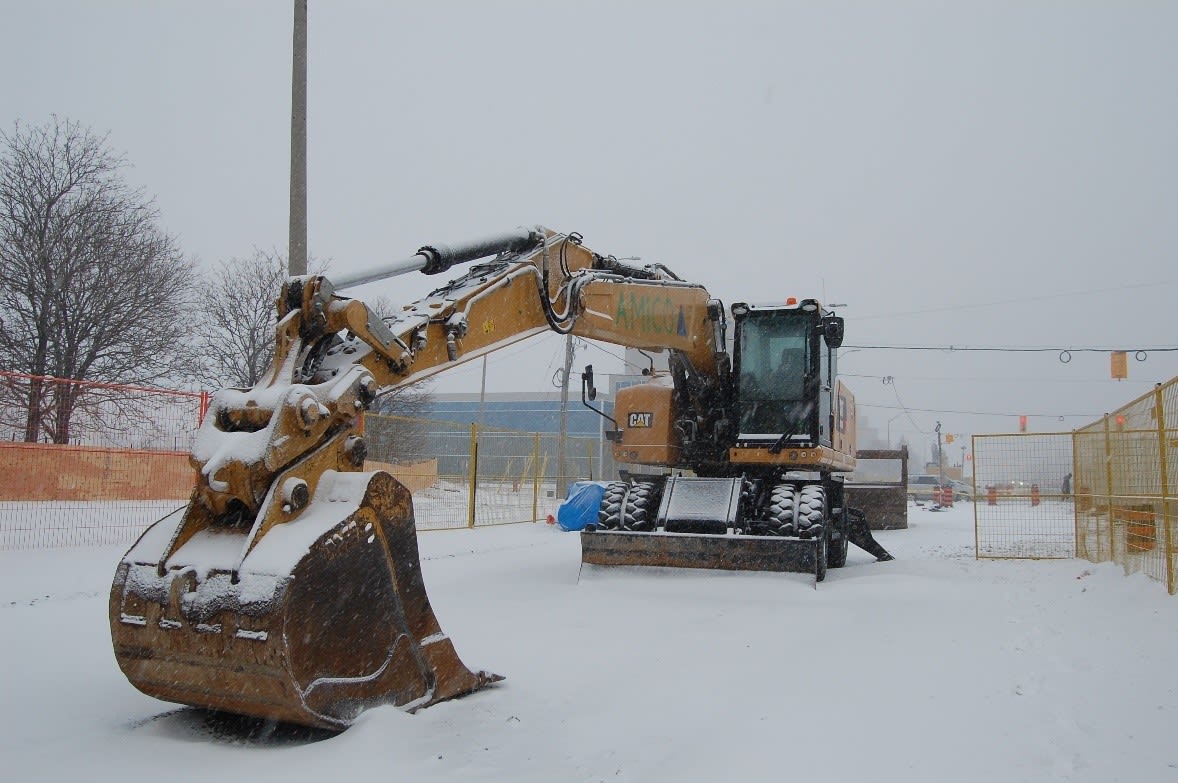 a tractor in the snow.