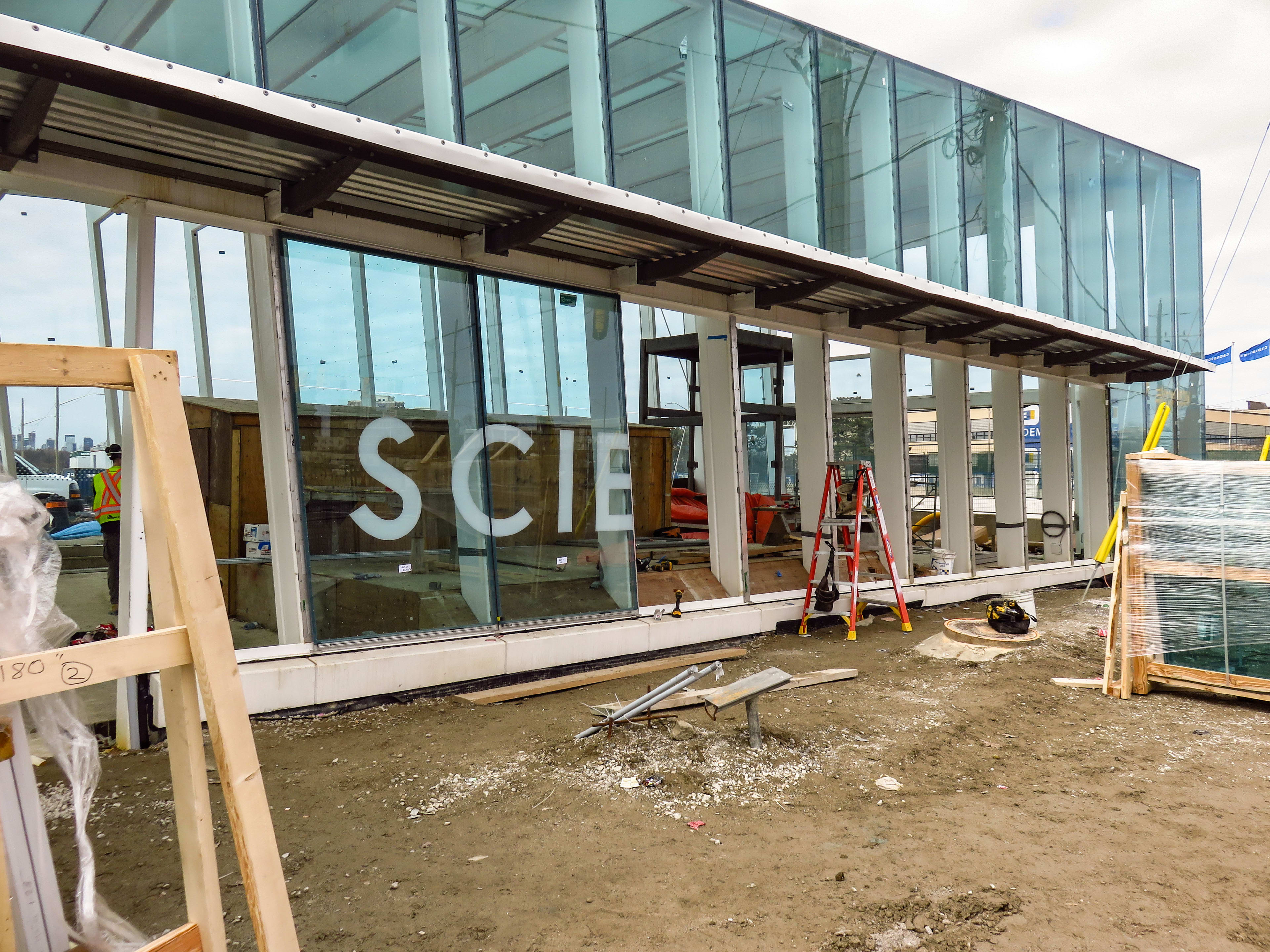 Science Centre' is being spelled out on main entrance windows.