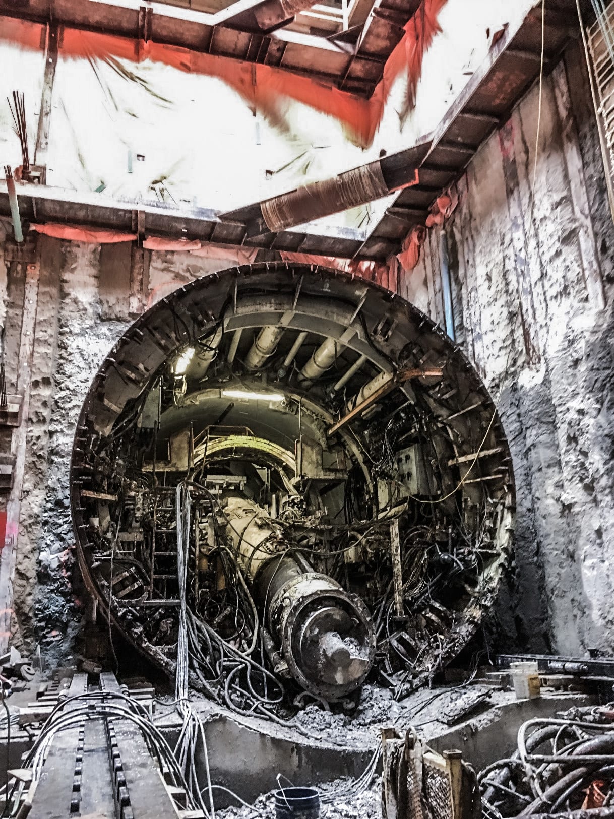 the inside of a giant machine. Lots of dirty metal.