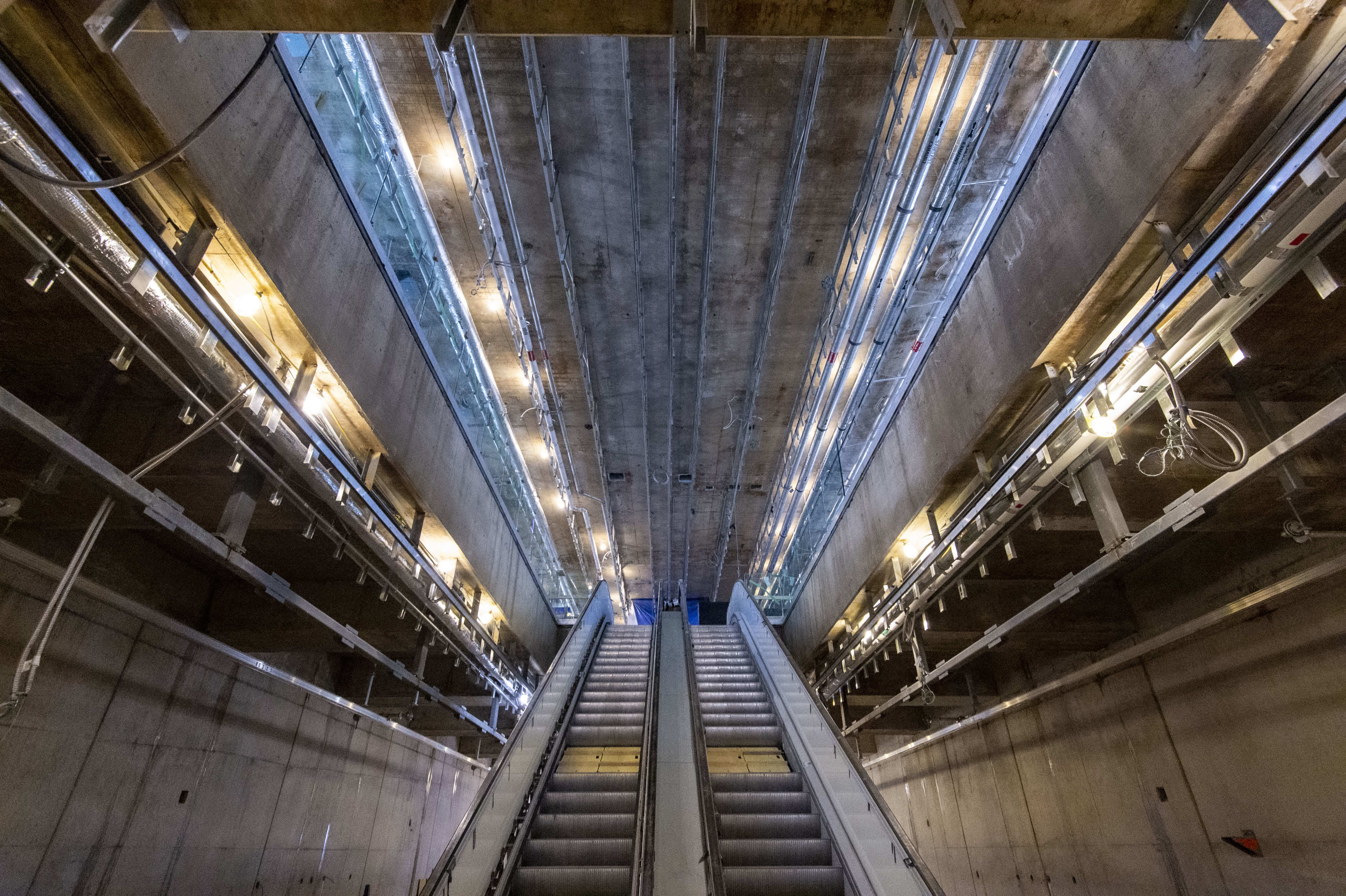 escalators heading to upper level.