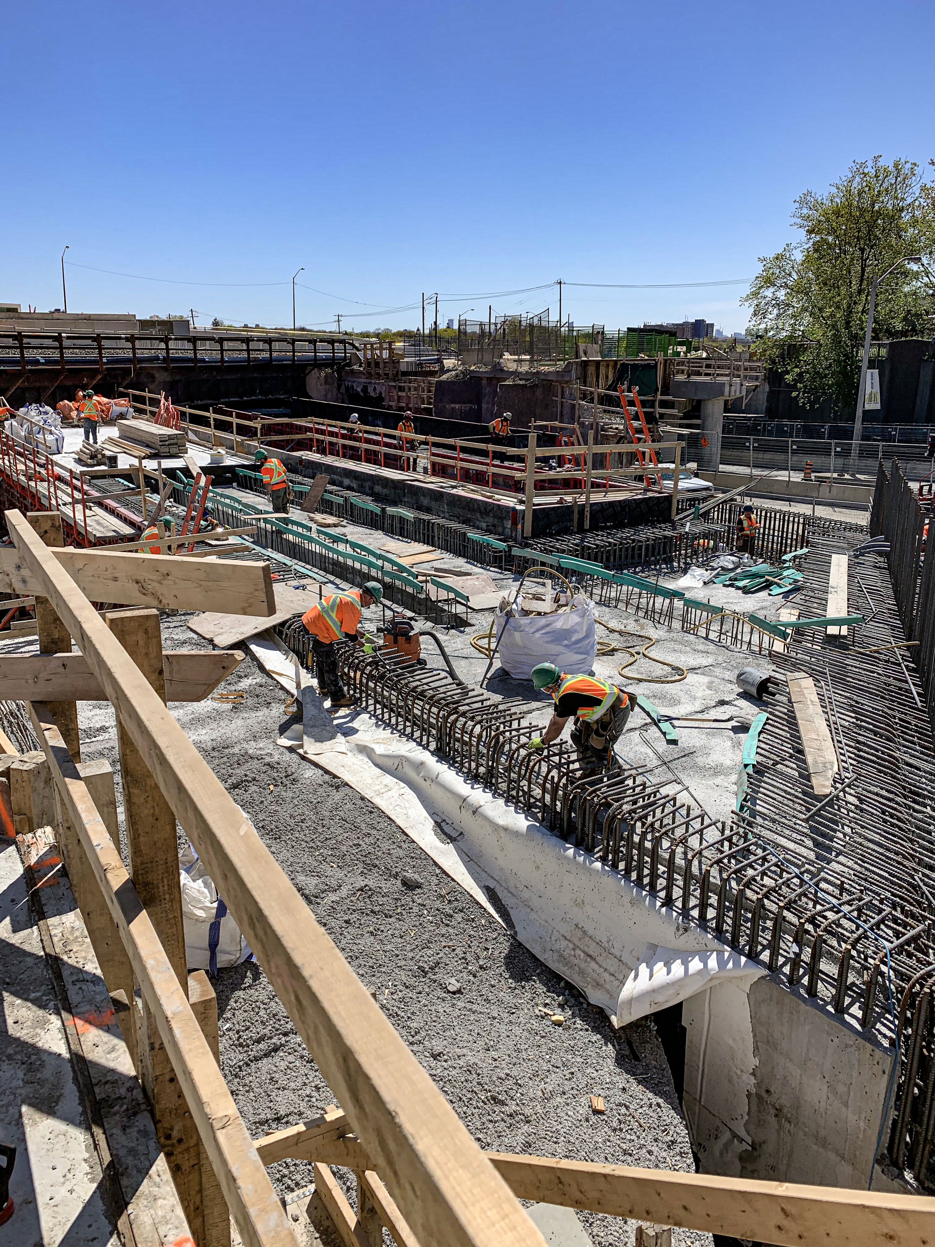 crews working on a concrete slab.