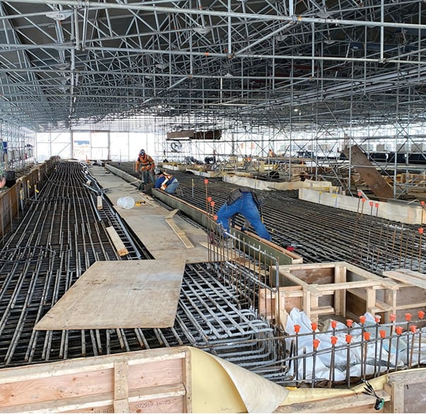 Formwork continues inside the tent at the Finch West LRT Maintenance and Storage Facility site