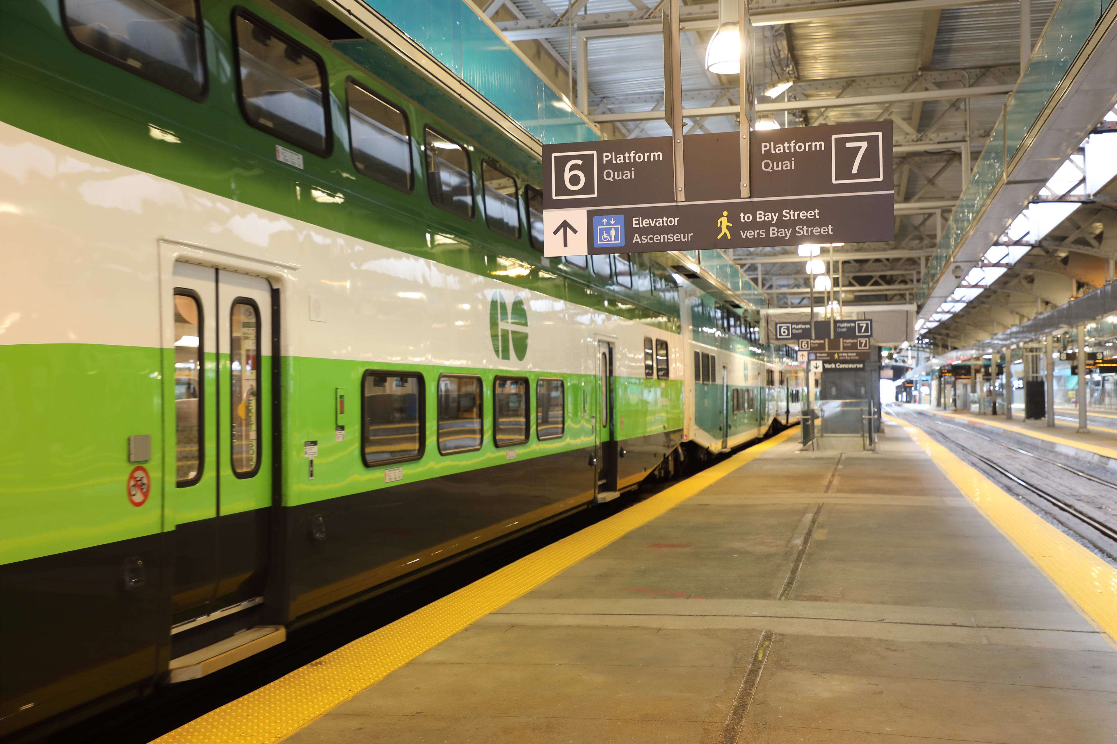 a platform with new lighting above, as well as a fresh yellow line with tactile bumps.