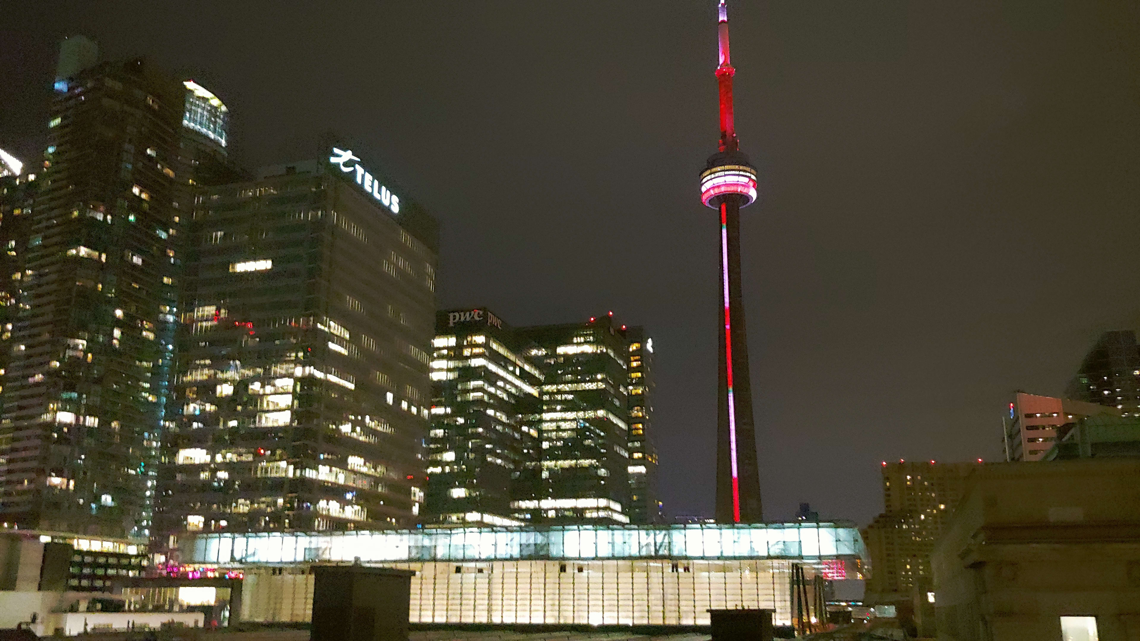 Union Station at night, with the CN Tower behind.