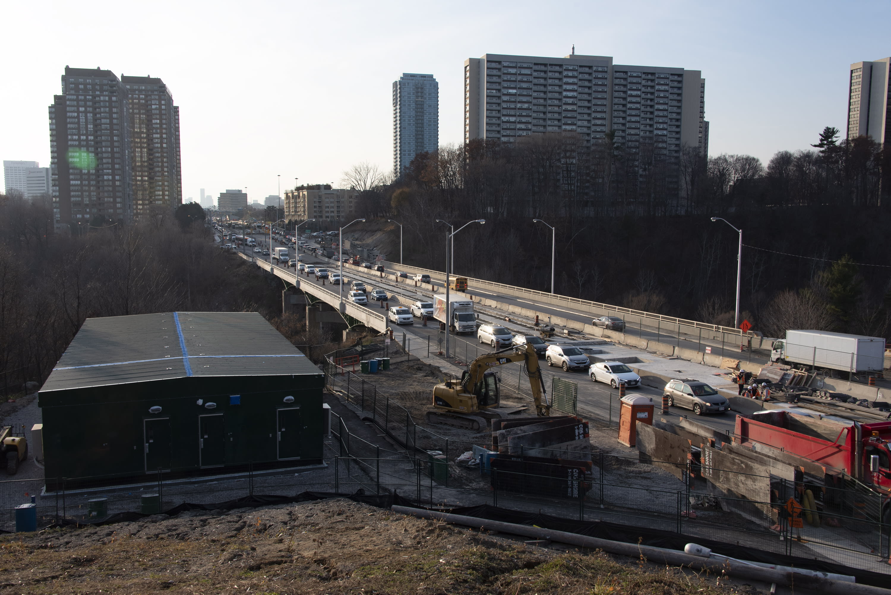 A building - as big as two shipping constainers - is installed next to Eglinton Ave.