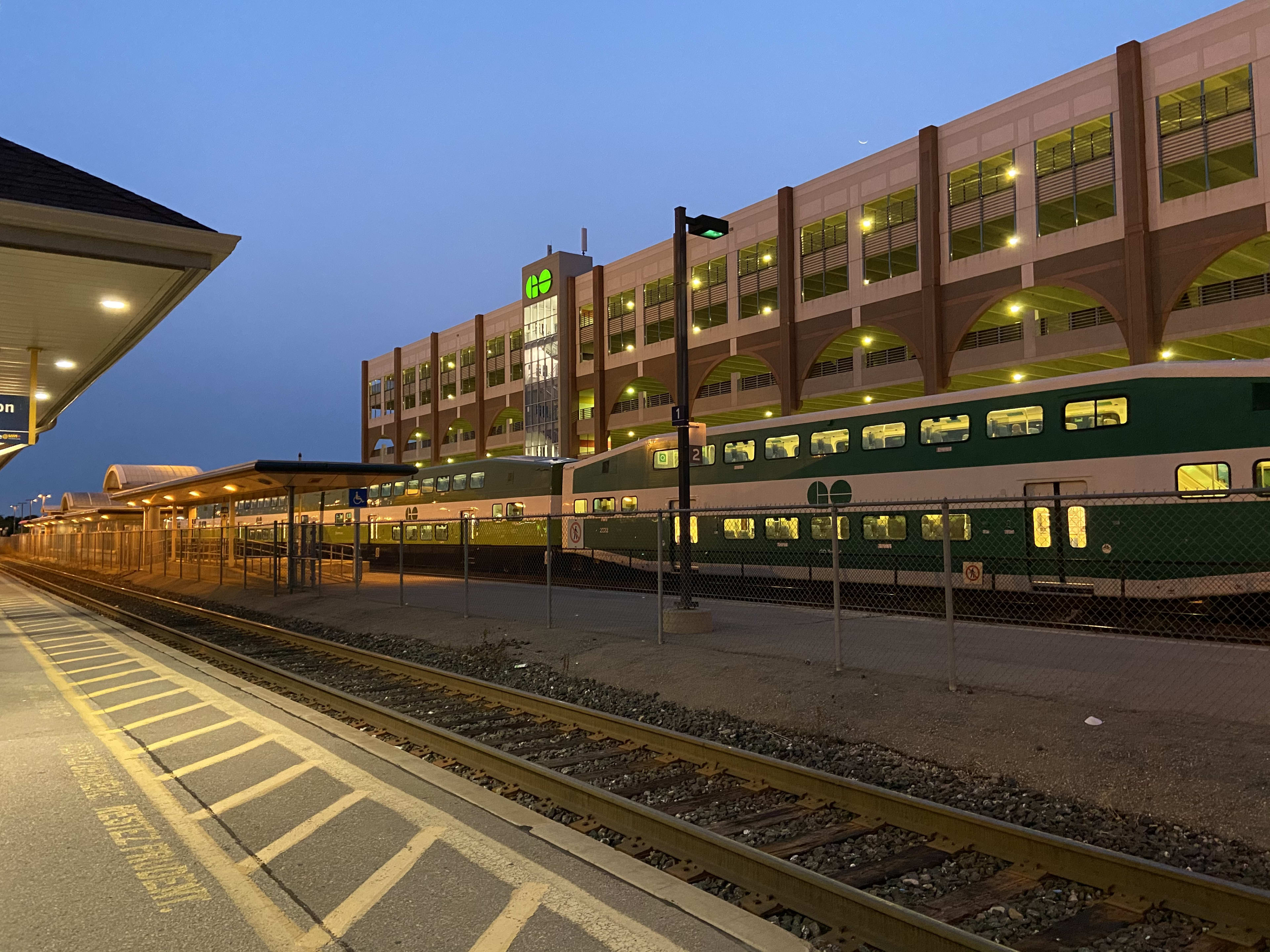 A GO train sits at the platform