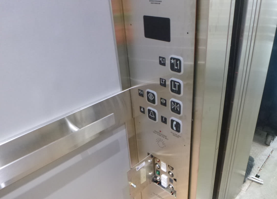 the elevator buttons inside the elevator at Oakville GO