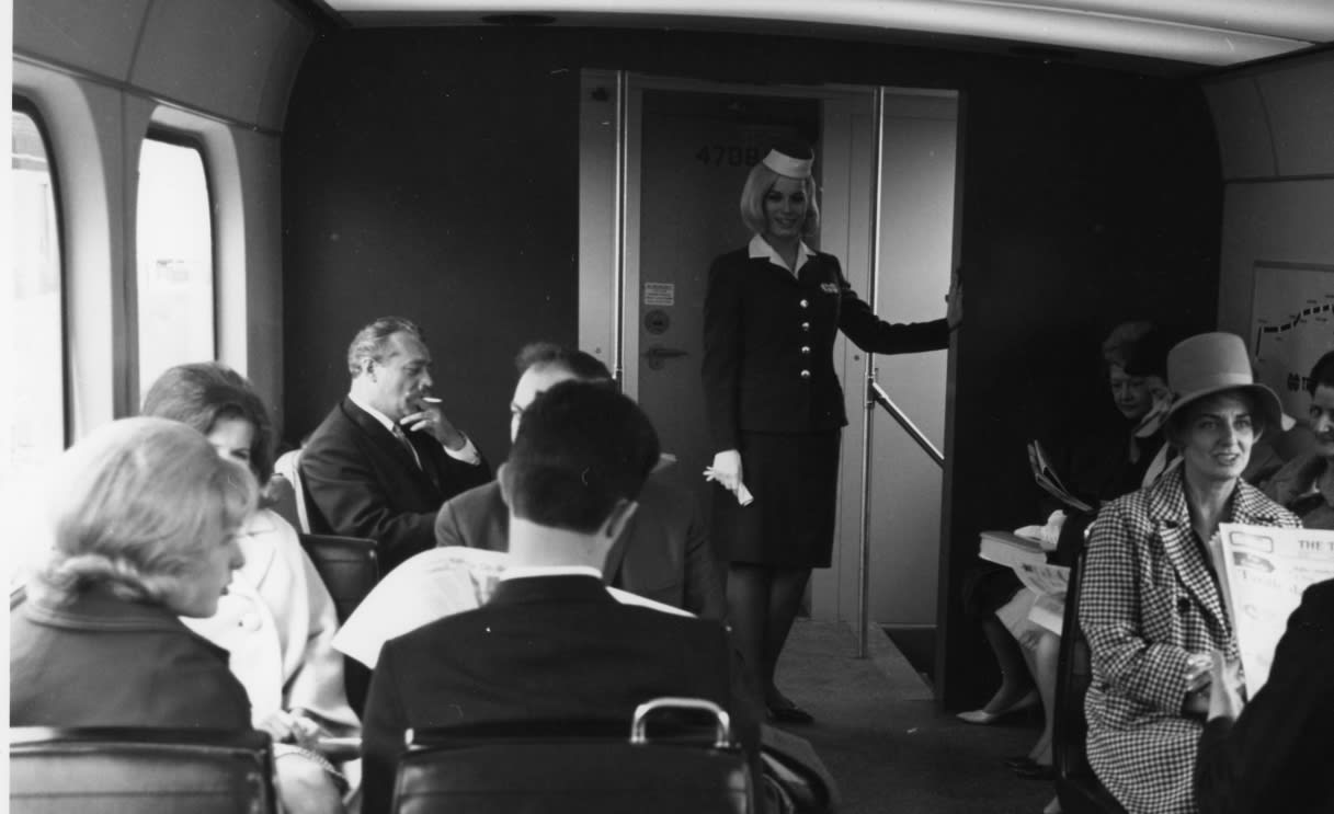 A GO passengers in the 1960s, one with a cigarette