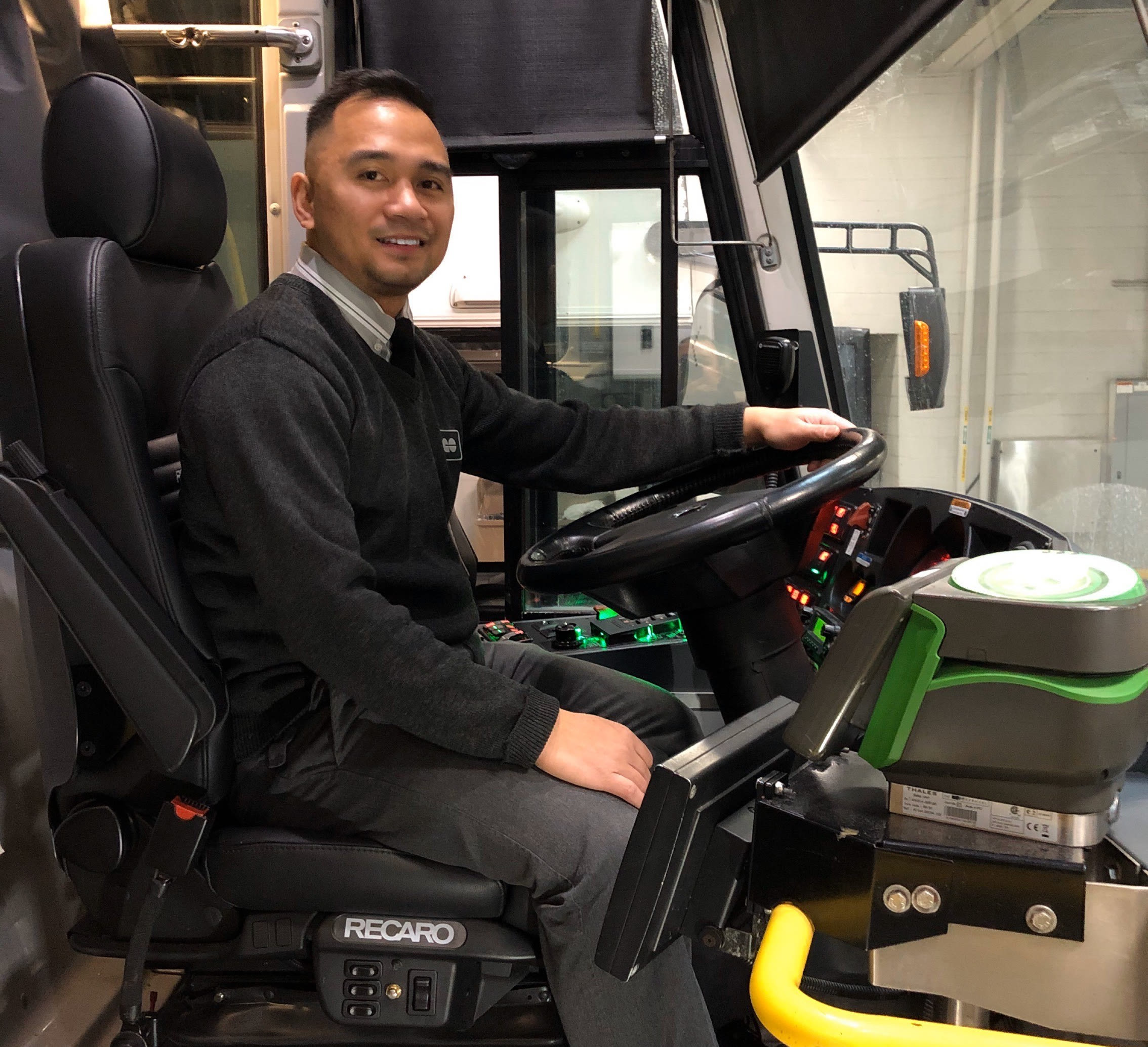 GO Transit bus driver driver Bryan Jeresano sitting in his GO bus driver seat.