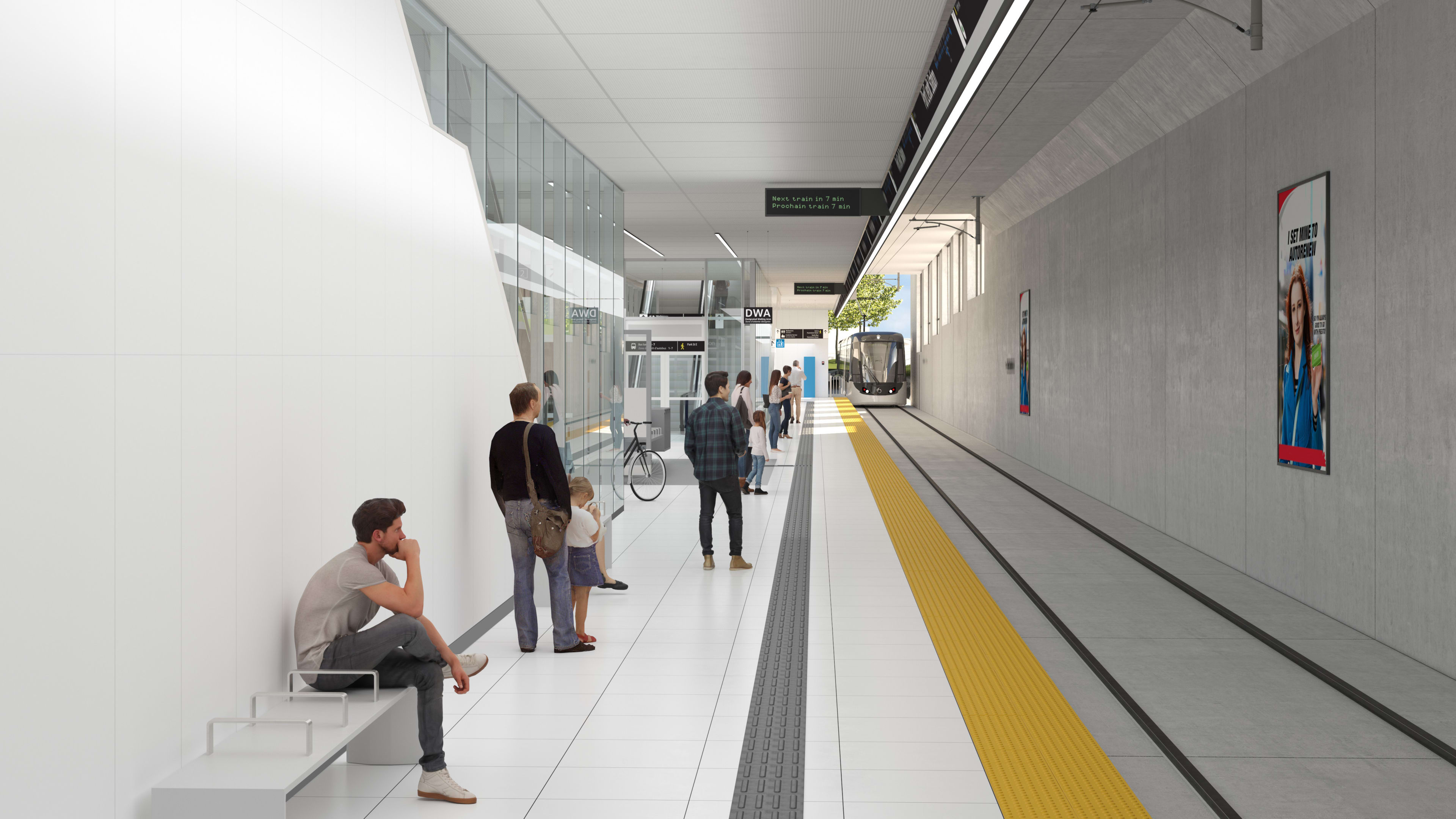 Customers wait for an incoming LRT.