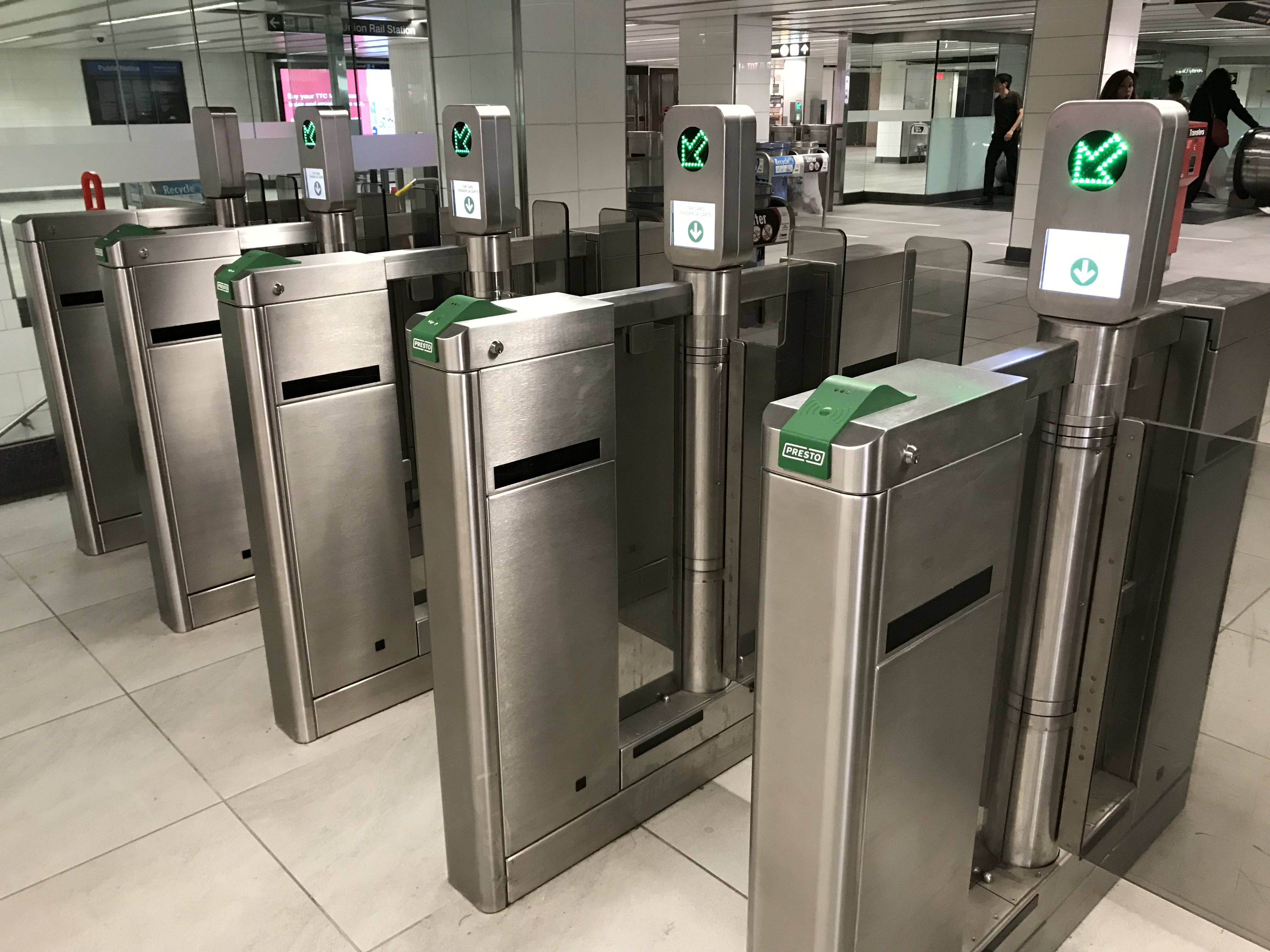 a line of TTC gates, with PRESTO readers.