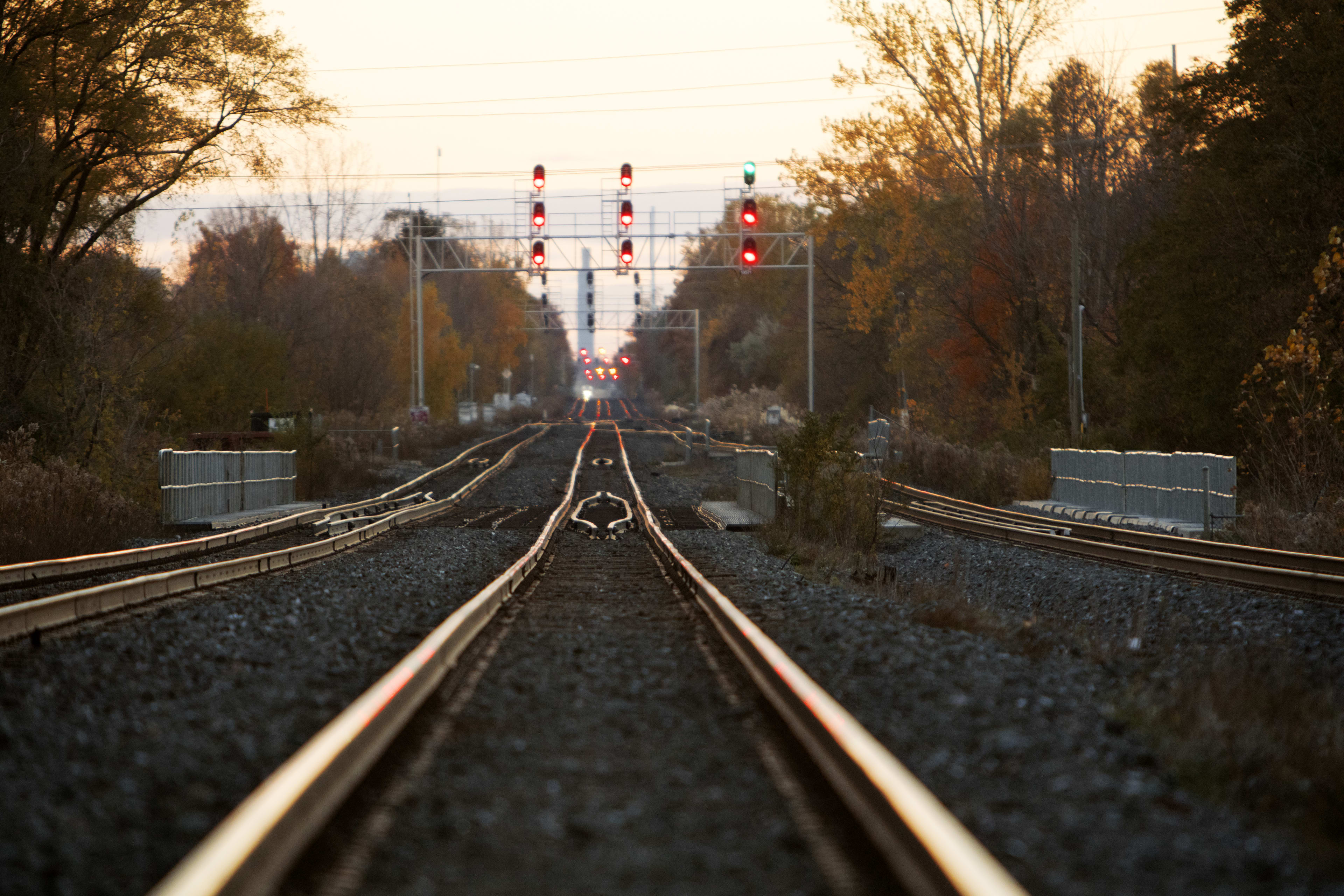 Shot of train tracks looking off into the distance with large sigal tower