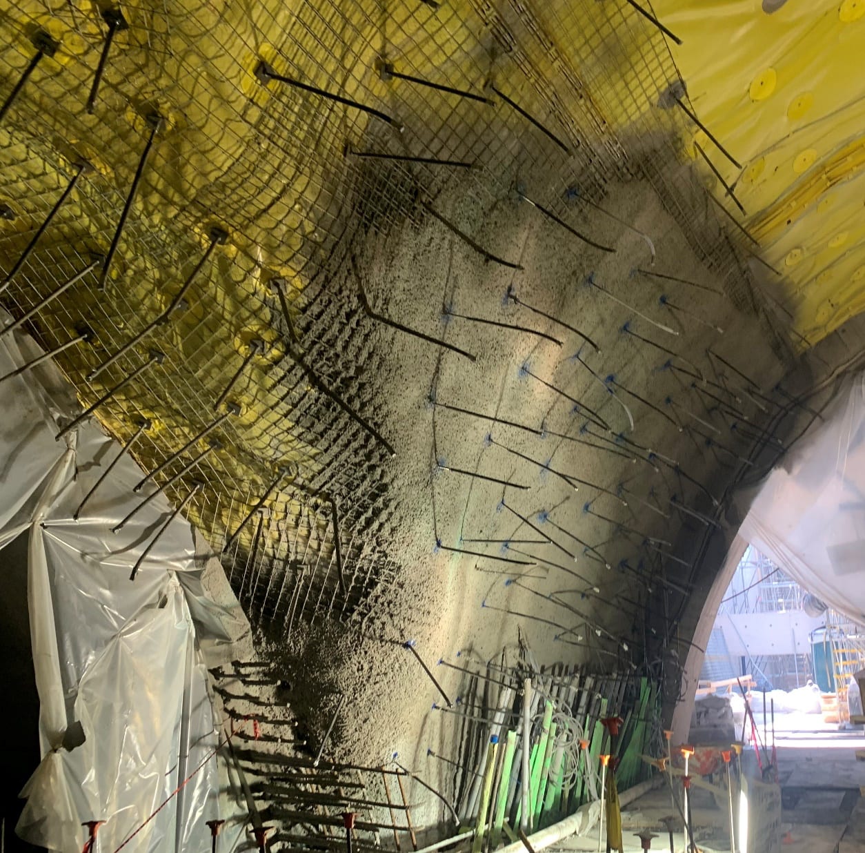 a tunnel with yellow spray on it.
