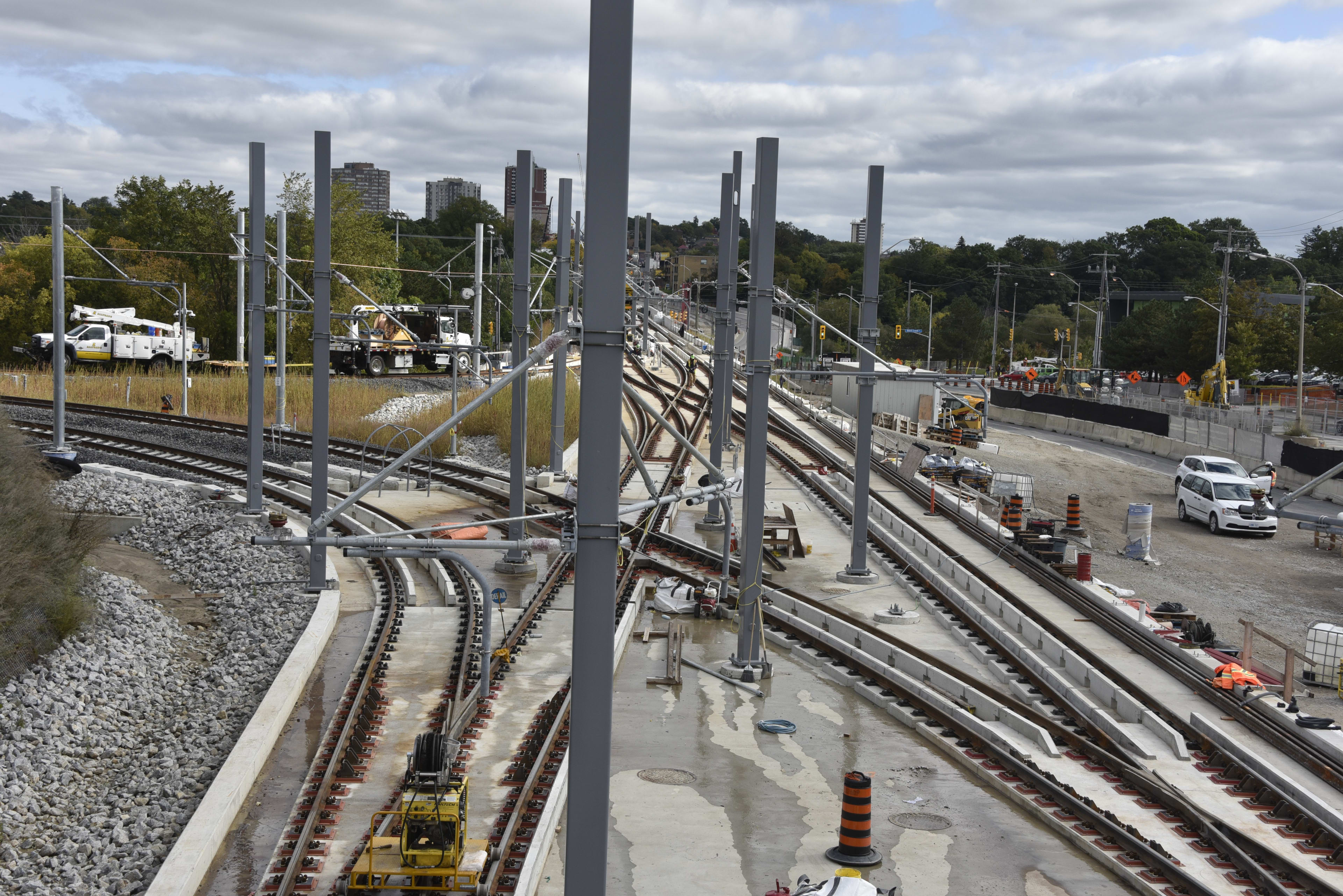 The picture shows power towers lining the rail-lines.