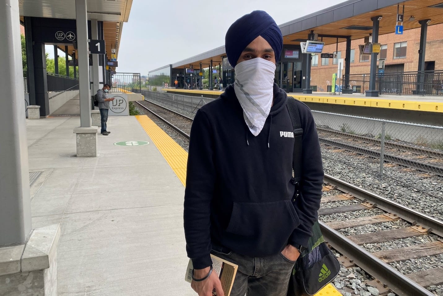 GO Customer Kunwardeep Singh on the platform waiting for his train