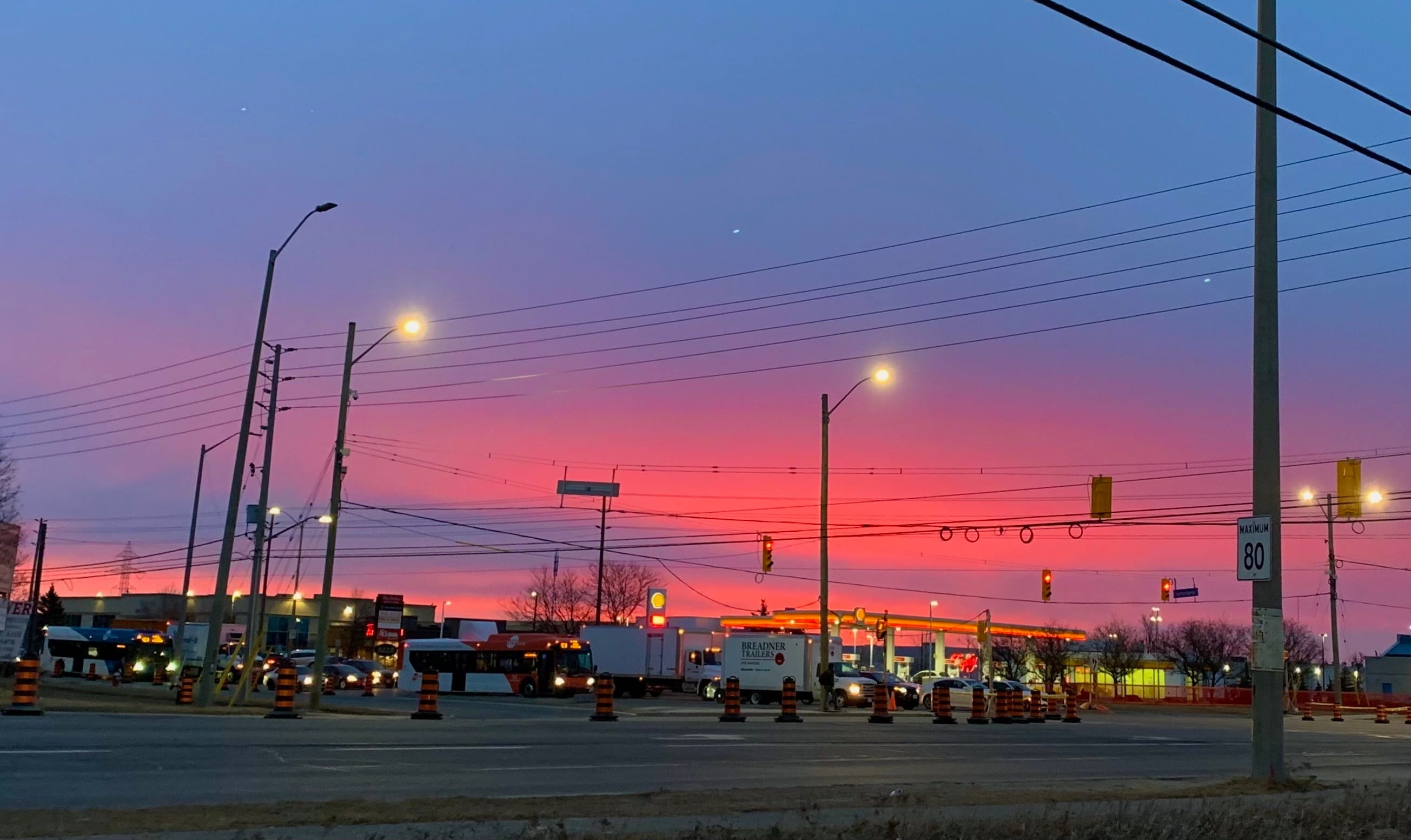 a sunrise over a street.