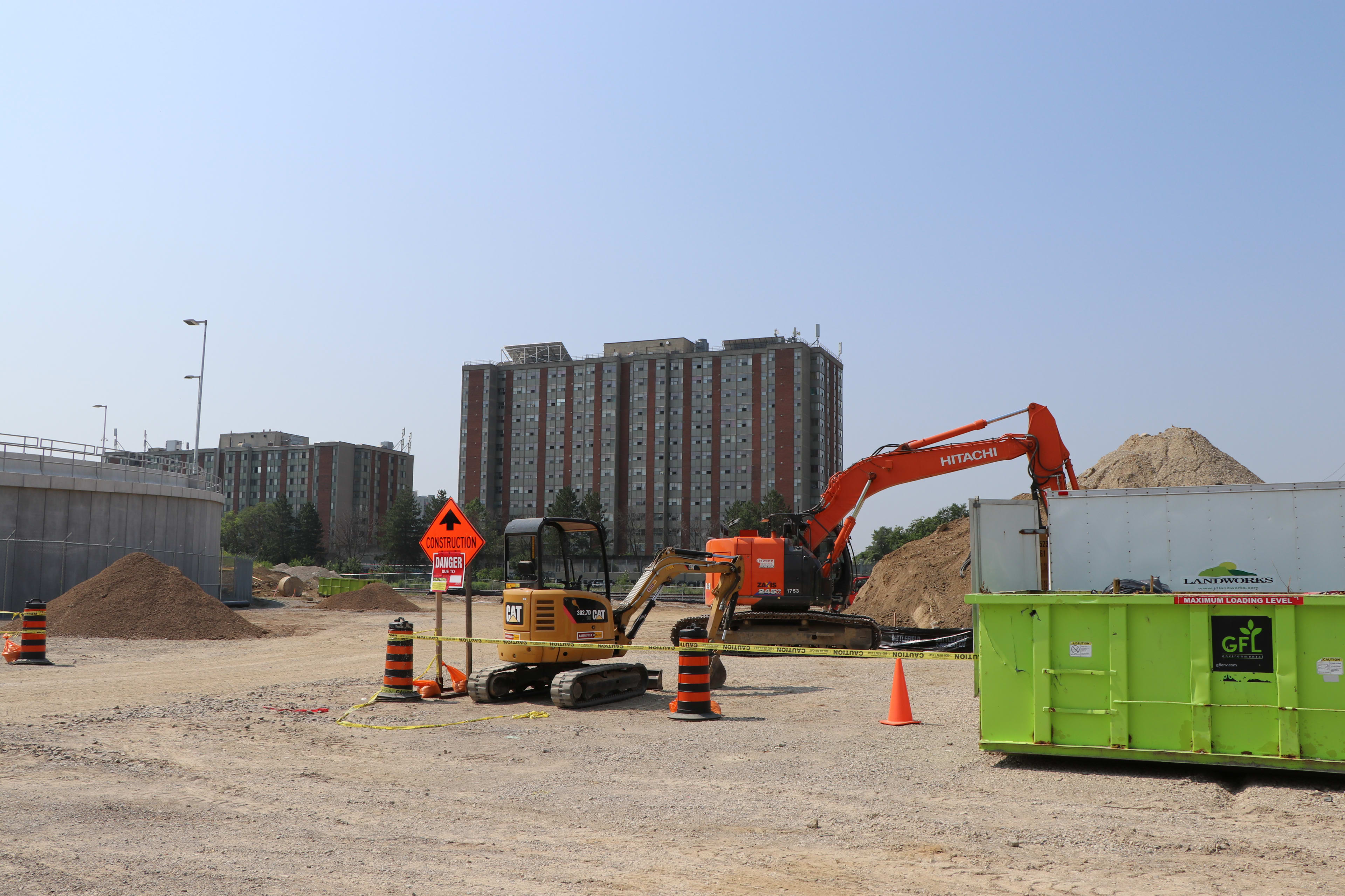Bulldozers work on the back-up power facility for the Crosstown LRT