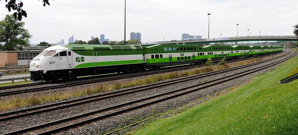 A GO train moves along the Lakeshore West line