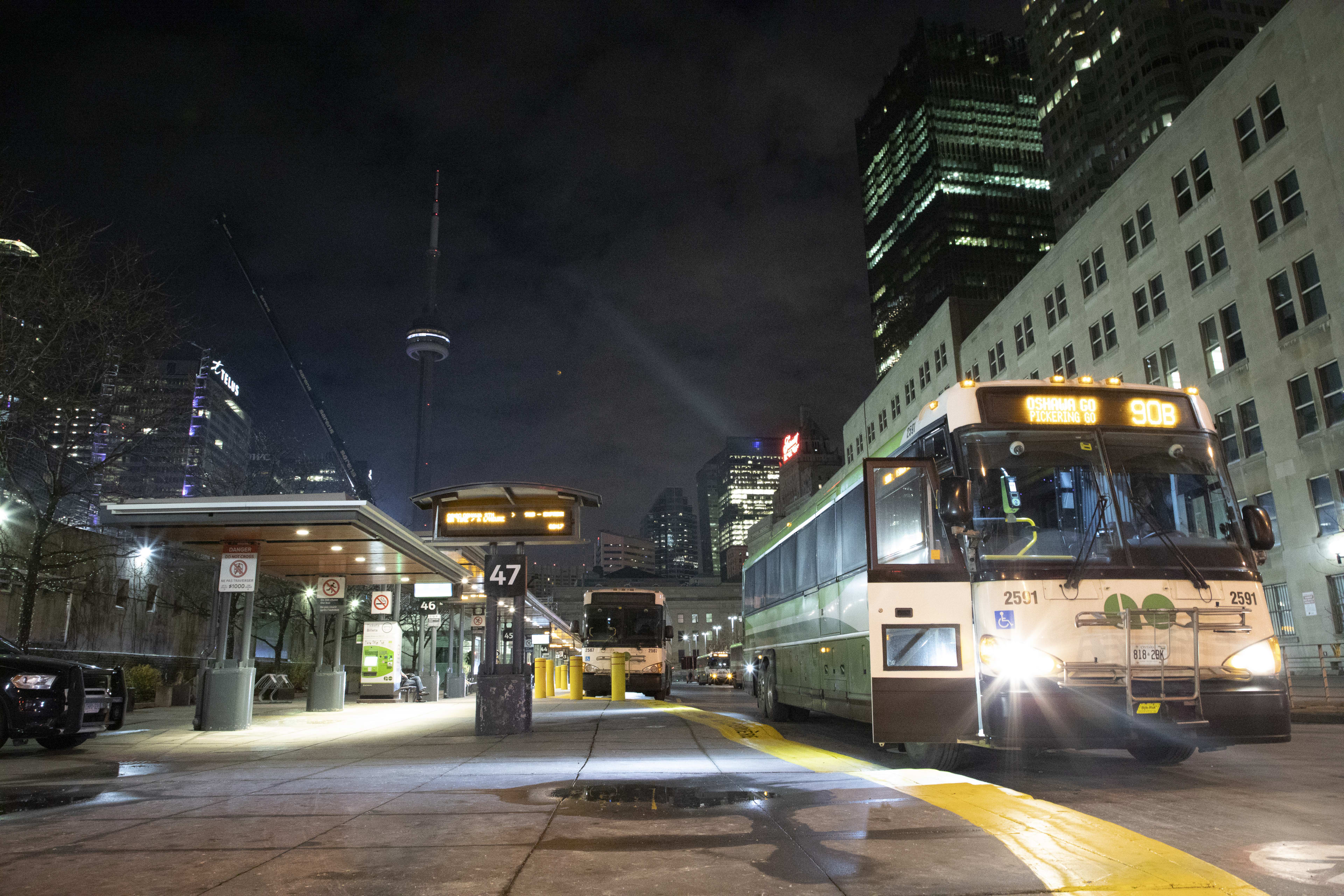 Images of buses at a station.