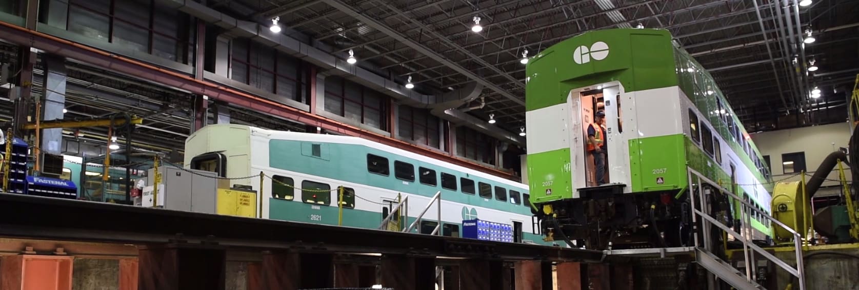 crews working on trains inside Willowbrook Maintenance Depot.