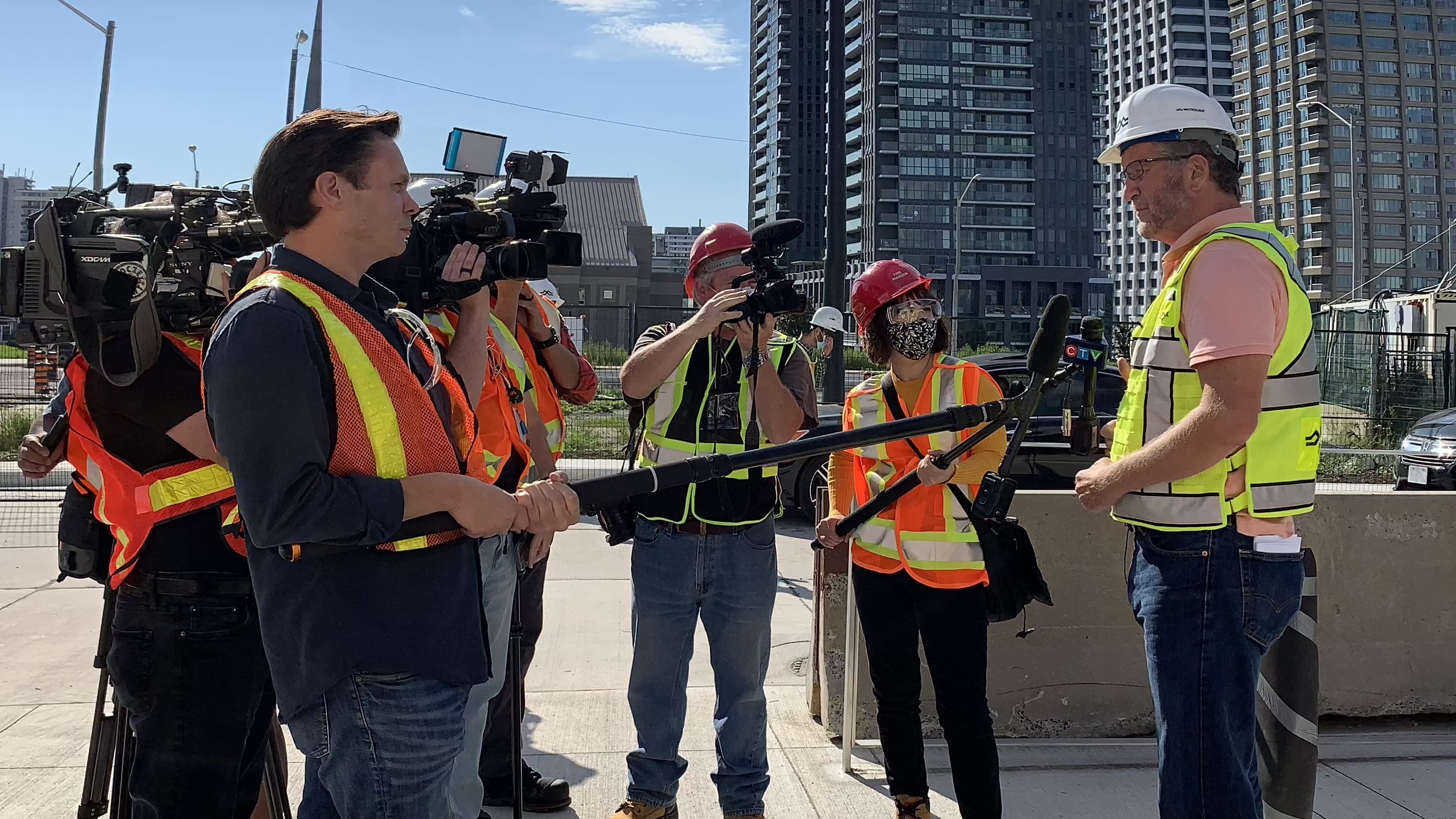 Media outlets interviewing and touring the ECLRT Science Centre station