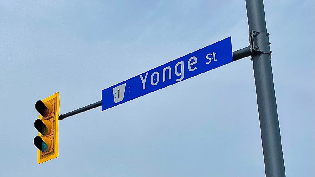 The Yonge St. street sign is shown.