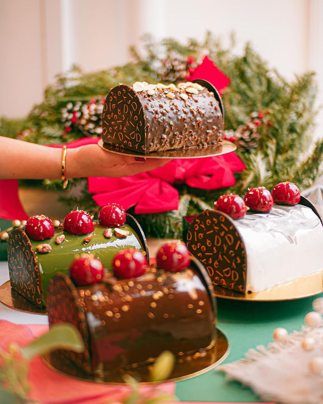 Bûche de Noël cakes from Delysses Luxury Desserts in Toronto, ON.