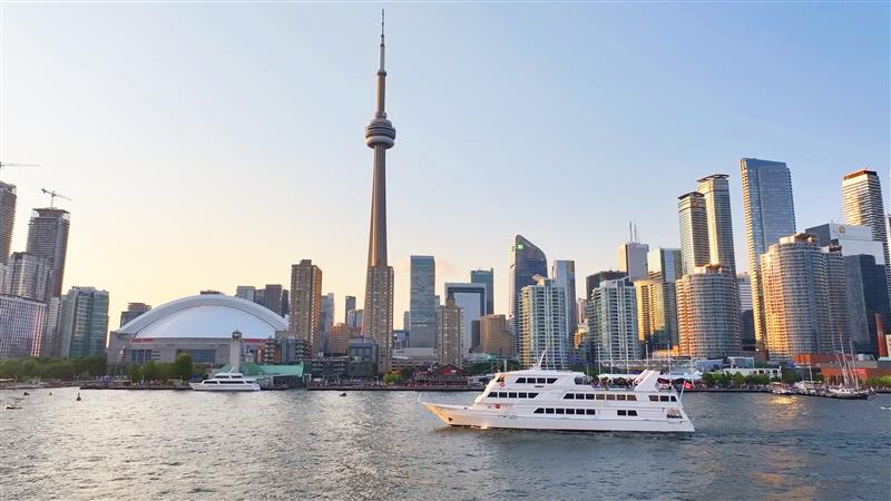 A City Cruises Toronto boat with the Toronto skyline