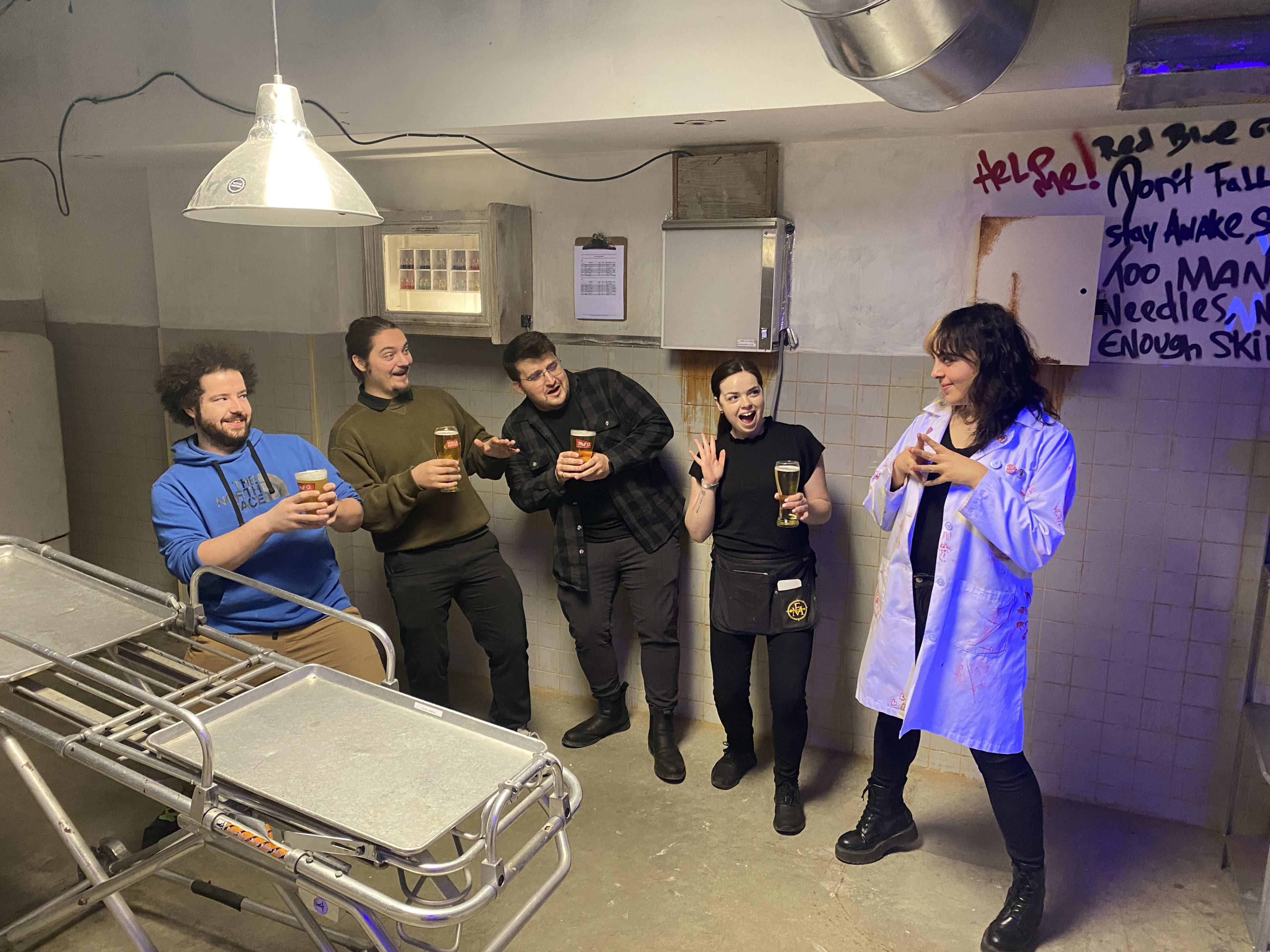 Group of people in an escape room at Escape Manor
