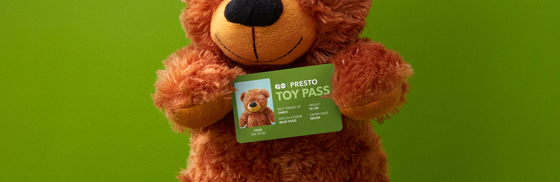 Teddy Bear holding new GO Toy Pass