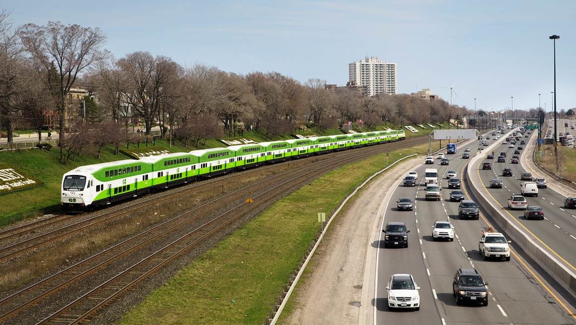 Lakeshore West train beside Gardiner Expressway