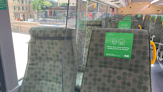 Bus seats with plexiglass dividers