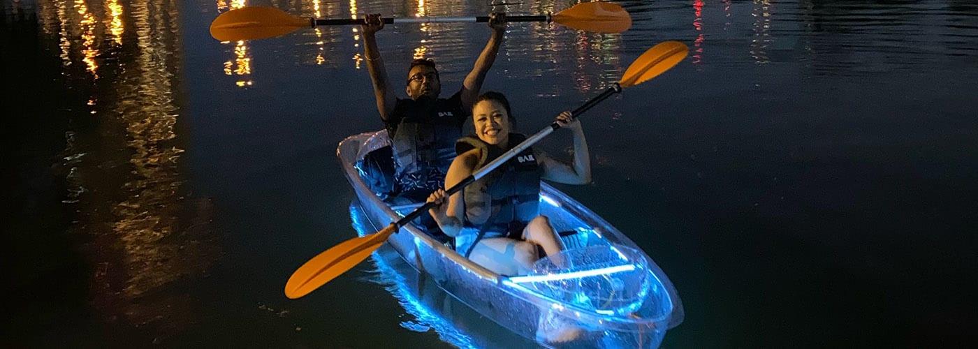 Nighttime glow-in-the-dark kayak rental in Toronto at Woodbine Beach or Humber River